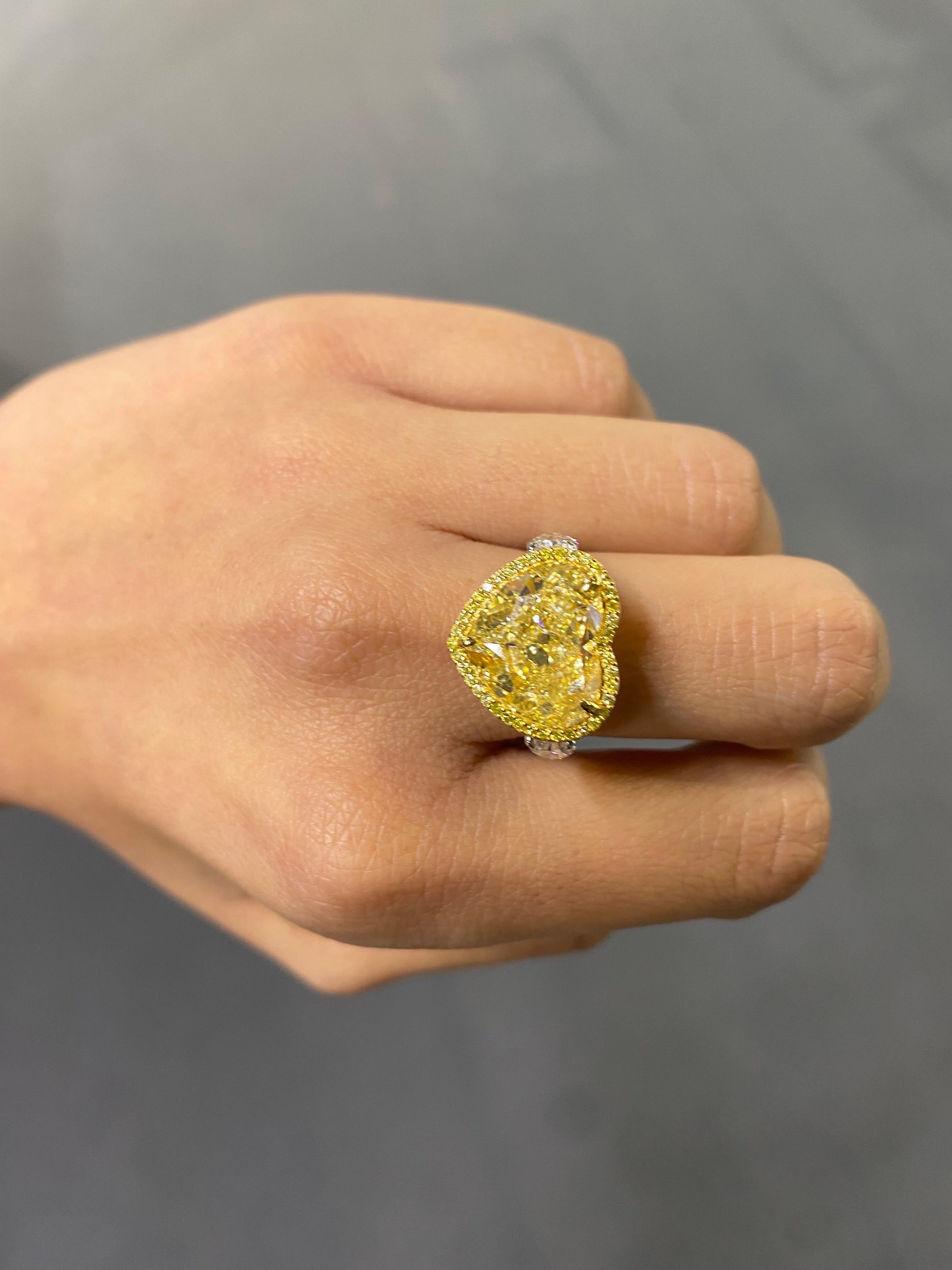 Modern Certified 9 Carat Heart Shape Yellow Diamond Three-Stone Engagement Ring