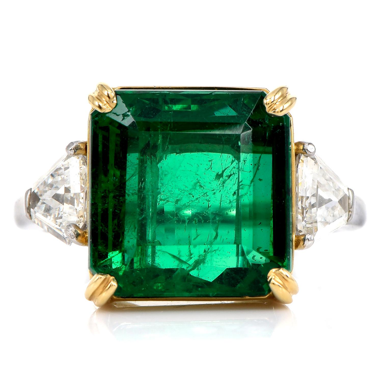 This Intense Green Emerald & Diamond Cocktail Ring is a must for every jewelry box!

Crafted in Platinum with 18K Yellow Gold Bezel, prominently features in the center an AGL Certified Zambian Square High-Quality Emerald, weighing approximately