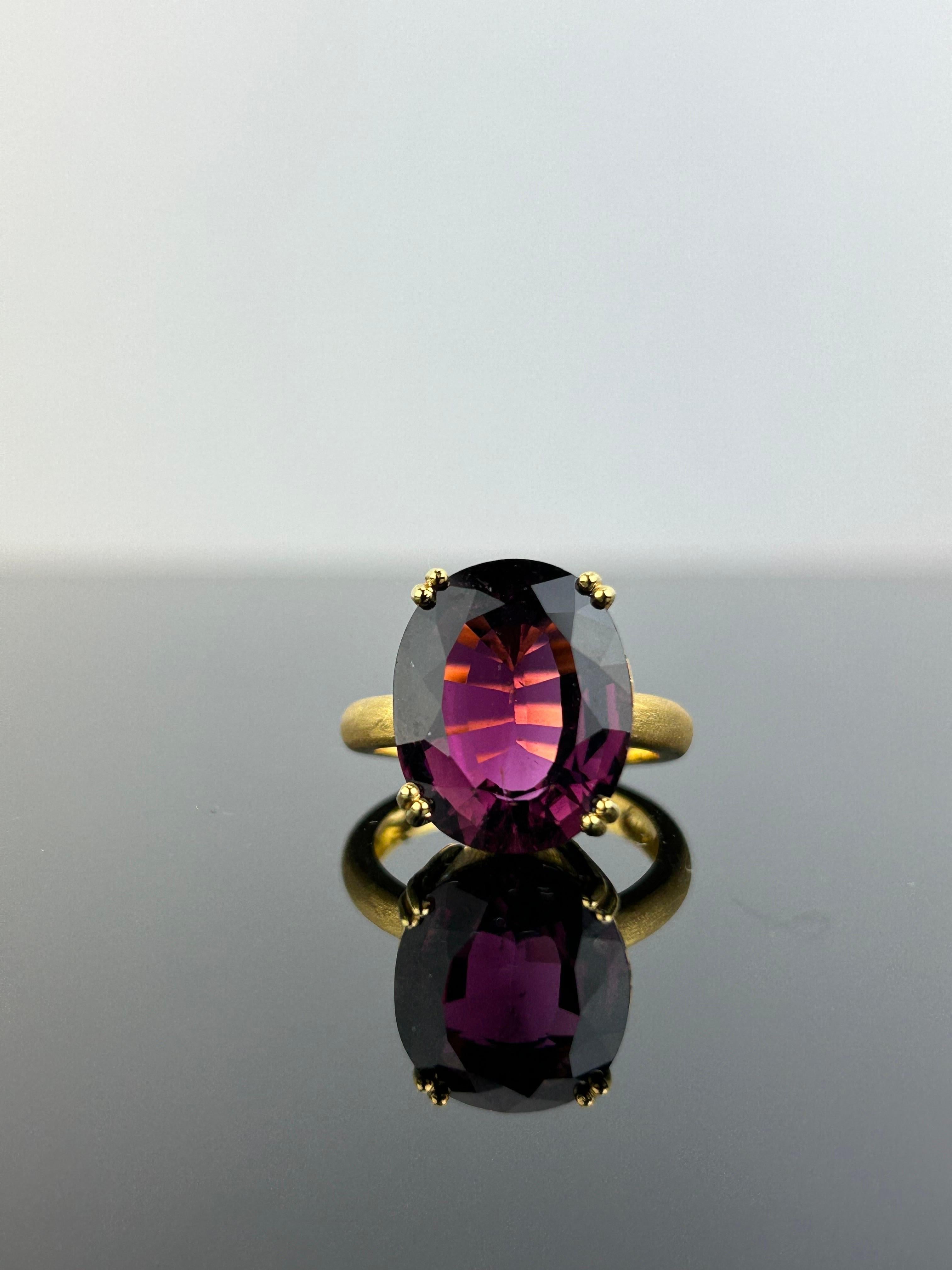 Make a statement with this beautiful 9.45 carat Pink Tourmaline cocktail ring, set in solid 18K matte finished Yellow Gold. The center stone has a beautiful pink color, with great luster and is absolutely transparent. The ring is sized at US7, can
