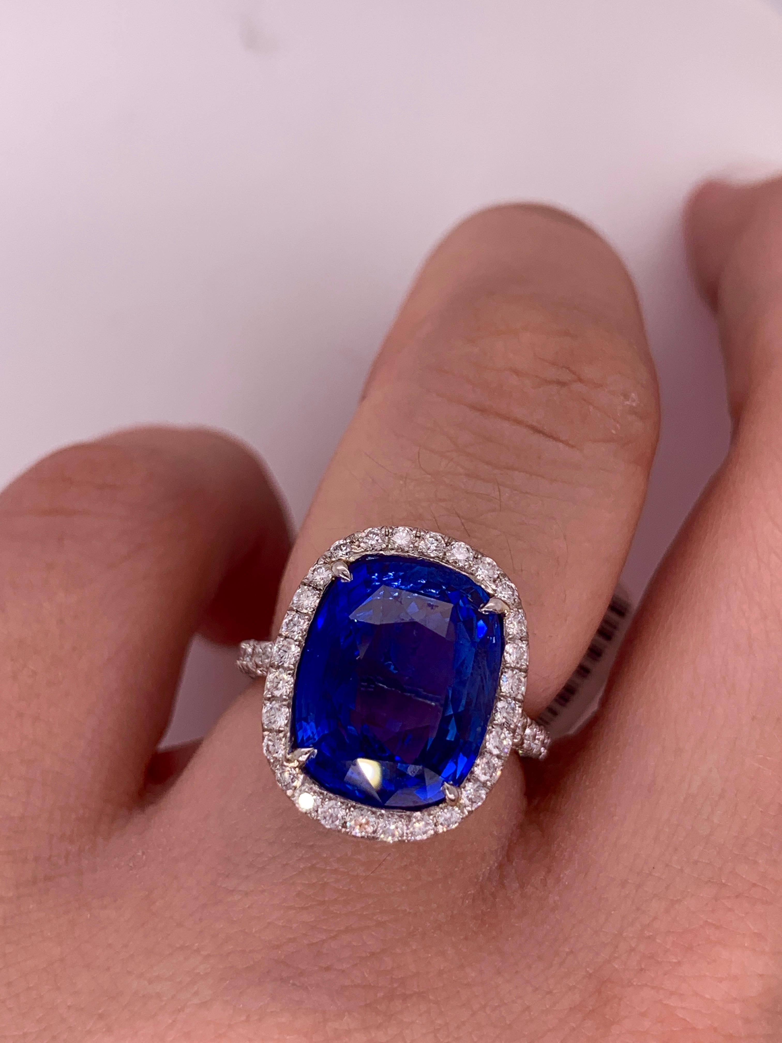 Magnificent Platinum Royal color blue sapphire and diamond ring, surrounded by delicate halo of diamonds. 

Color Gem information:
9.55 Carat Ceylon Royal Blue Sapphire
Certified by GIC Laboratory

Diamond information:
2.00 Carats of round brilliant