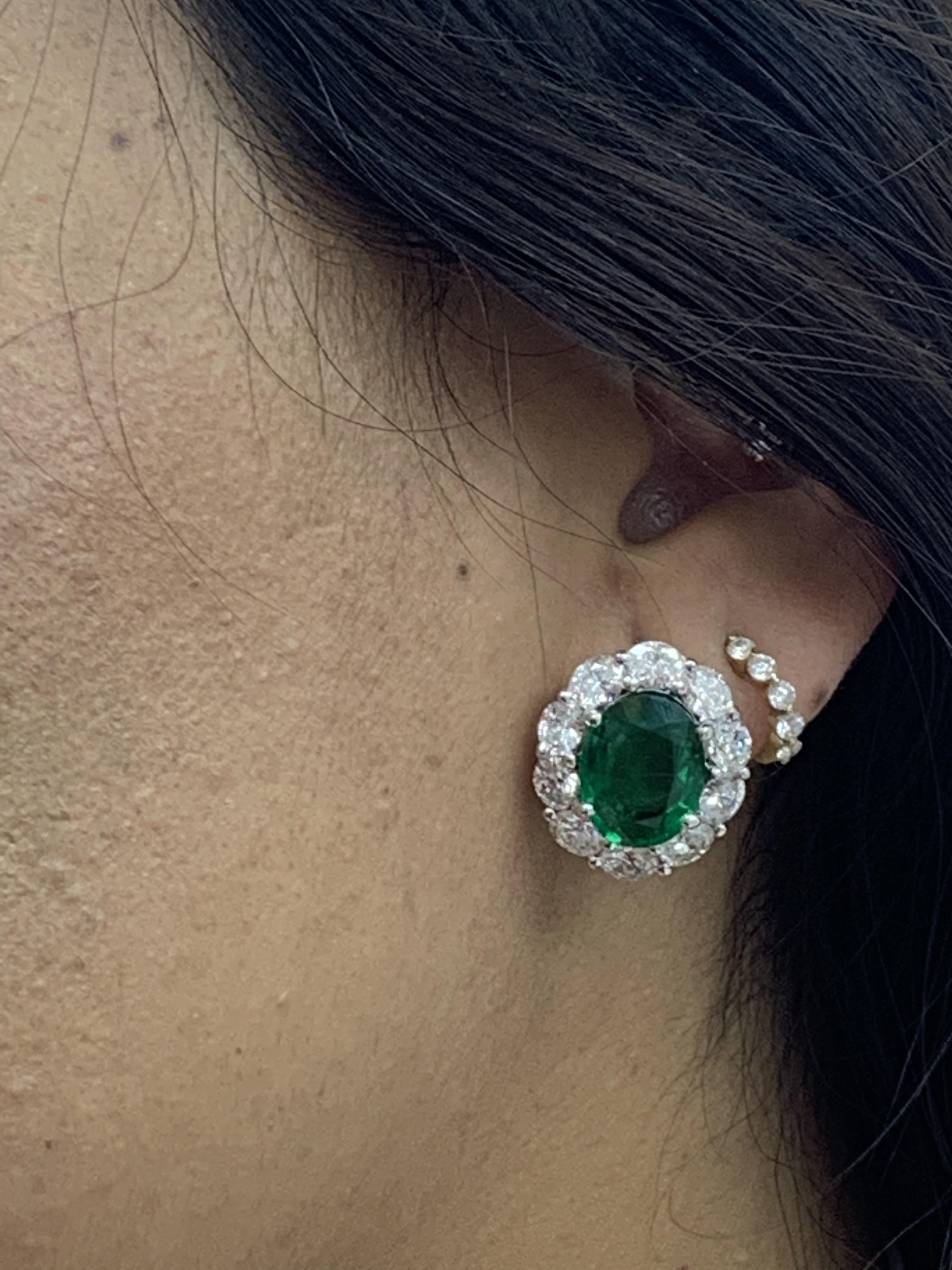 Certified 9.70 Carat Oval Cut Emerald and Diamond Halo Earrings in 18K WhiteGold For Sale 10
