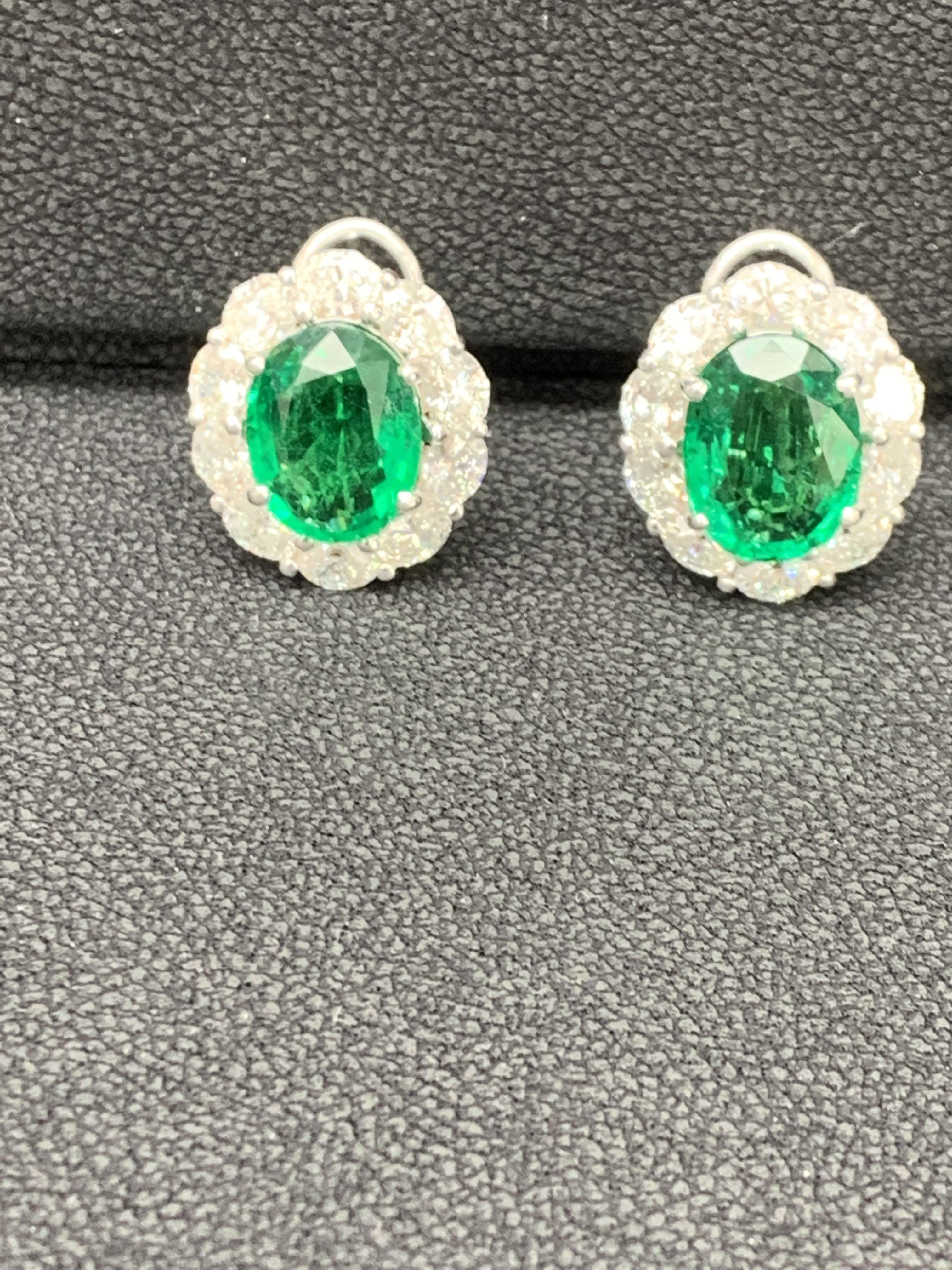 Certified 9.70 Carat Oval Cut Emerald and Diamond Halo Earrings in 18K WhiteGold For Sale 3