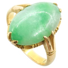 Anillo ovalado de jadeíta verde musgo en nieve birmana antigua certificada en oro de 18 quilates
