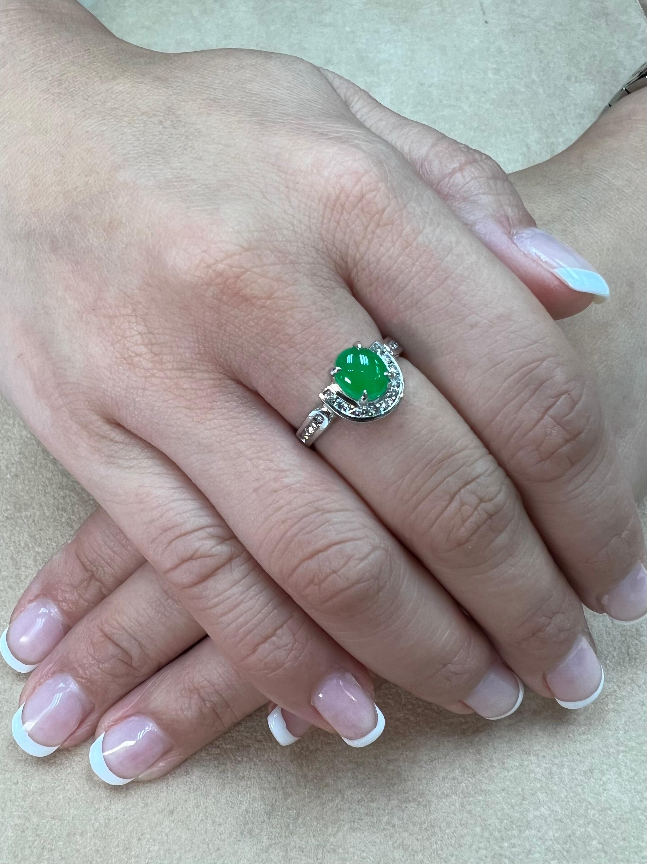 Please check out the HD video! Here is a bright apple green oval cabochon jade and diamond ring. This ring is handmade and designed with the lucky horseshoe motif. This jadeite jade is certified natural with no treatment or enhancement. The ring is
