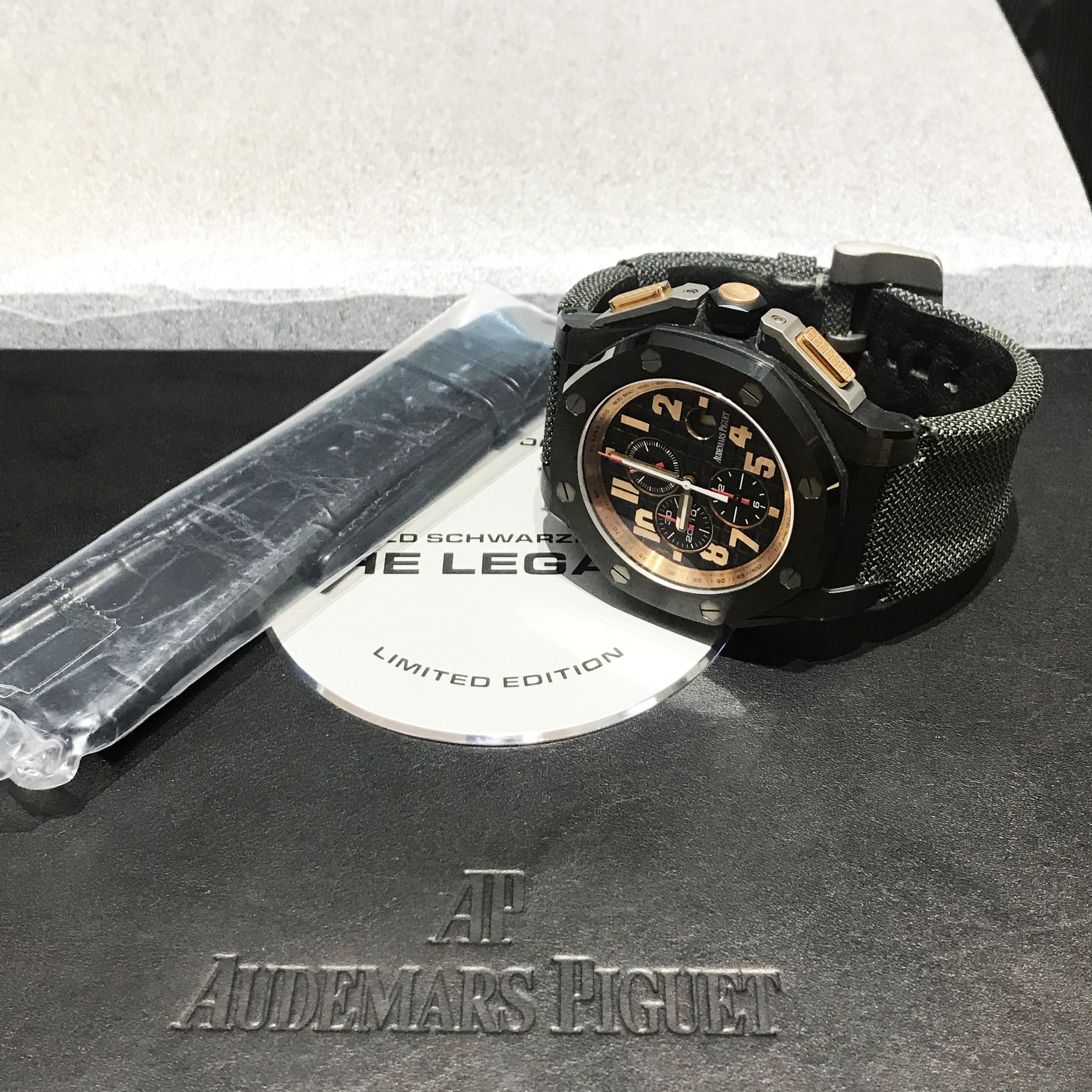 Audemars Piguet Royal Oak Offshore Reference #:26378IO.OO.A001KE.01. Ceramic case with a black rubber strap. Fixed bezel. Black dial with luminous hands and Arabic hour markers. Tachymeter scale appears around the outer rim. Dial Type: Analog. Date
