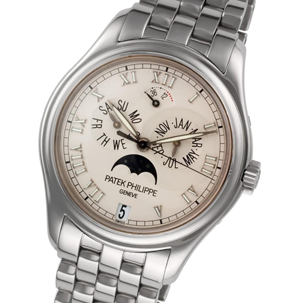 Certified Authentic Patek Philippe Annual Calendar 47400, White Dial In Good Condition For Sale In Miami, FL