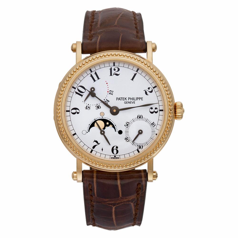 Patek Philippe Power Reserve Reference #:5015J. Patek Philippe Power Reserve in 18k gold on original brown alligator strap with PP 18k tang buckle. Watch has hobnail bezel. Auto w/ subseconds, moonphase and power reserve. Hinged back covers movement