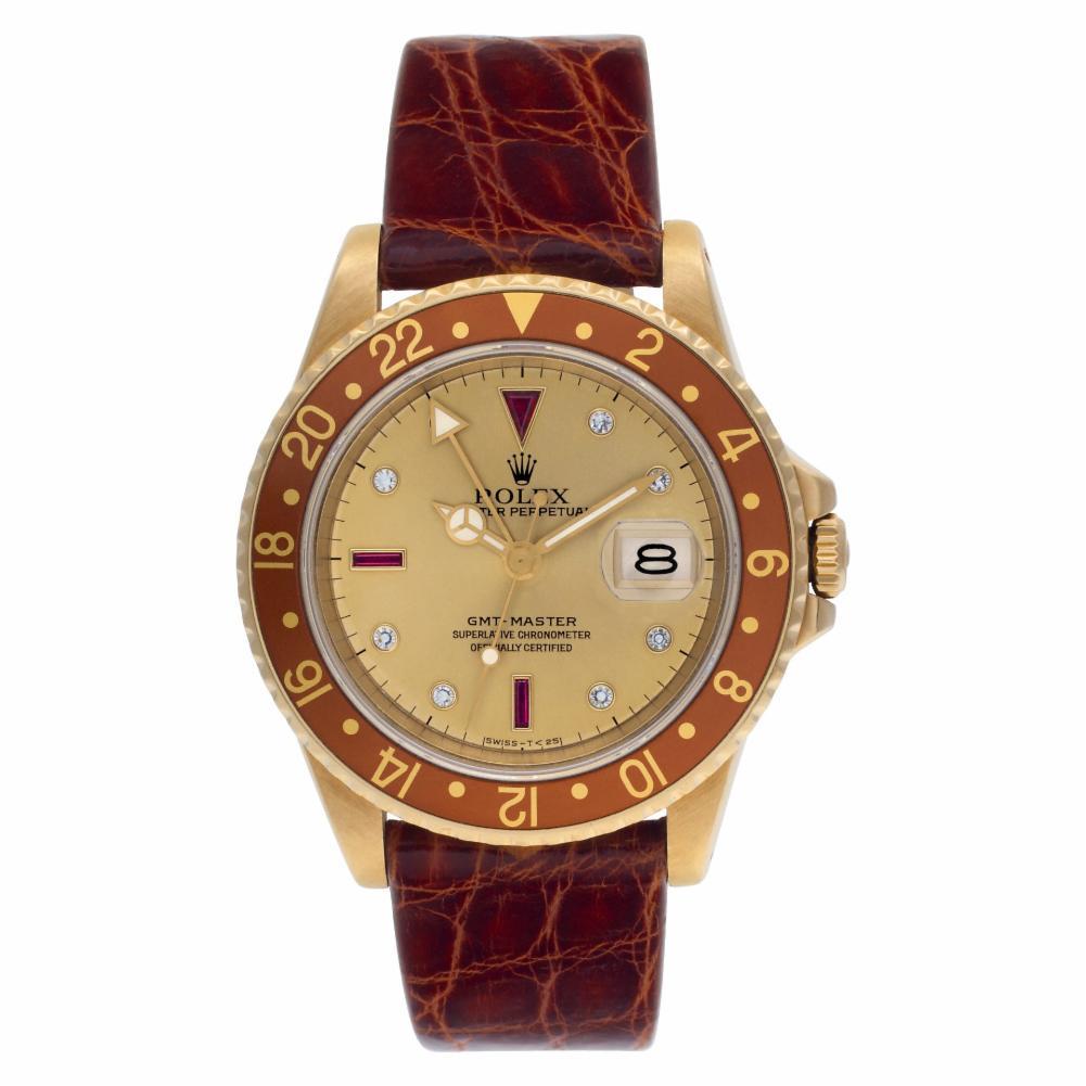 Rolex GMT Master Reference #:16758. Rolex GMT-Master in 18k yellow gold with original serti diamond & ruby dial on brown crocodile strap. Auto w/ sweep seconds and date. Ref 16758. Circa 1981. Fine Pre-owned Rolex Watch. Certified preowned Classic