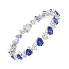Bracciale Tennis con diamanti e zaffiri blu certificati in oro bianco 14 carati