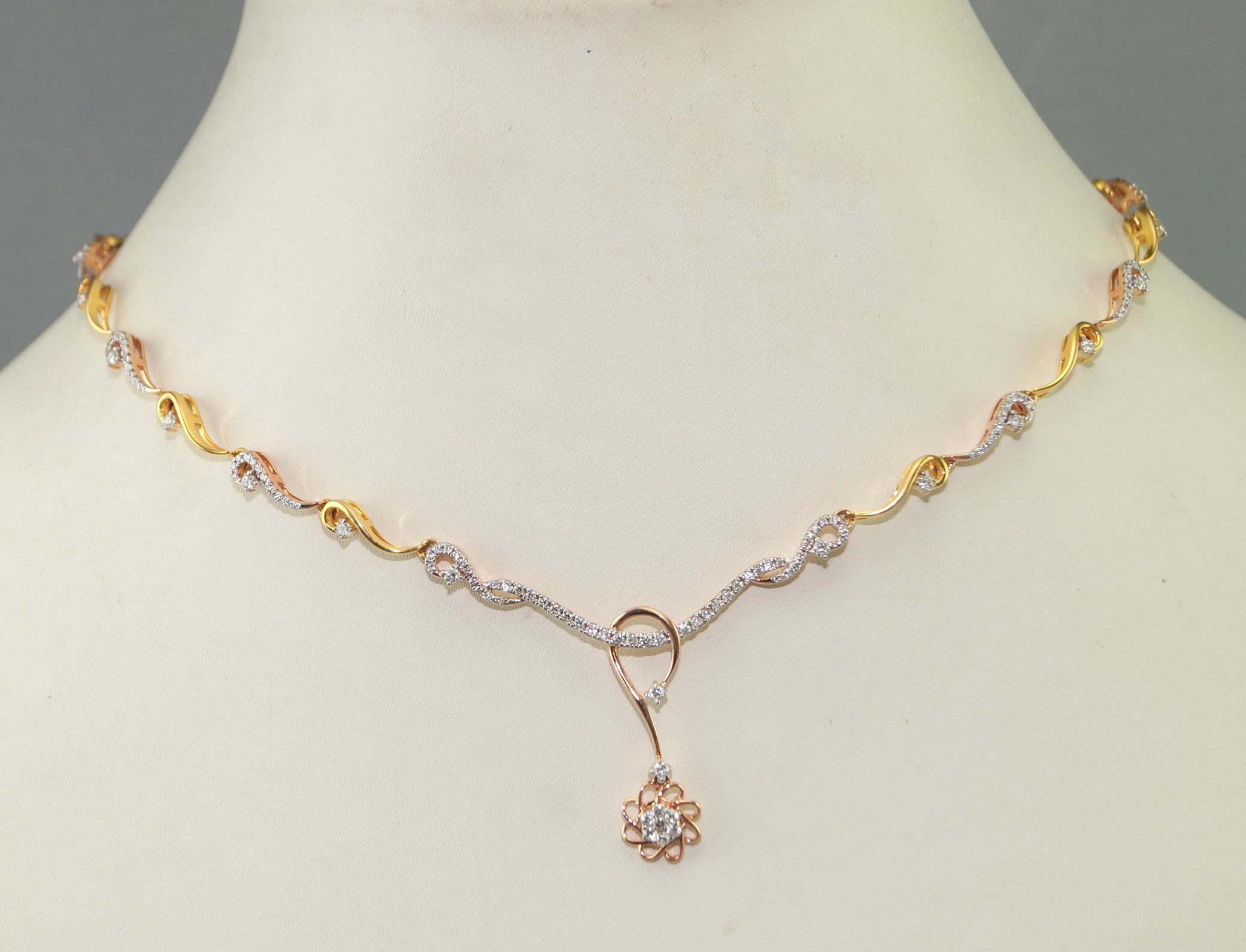 This gorgeous dual tone diamond necklace with matching earrings in solid 18K gold is a pure perfection. This necklace set consists of:

Net weight- 18.02 grams

Diamond type- Brilliant cut diamonds
Diamond origin- Natural real
Diamond weight-