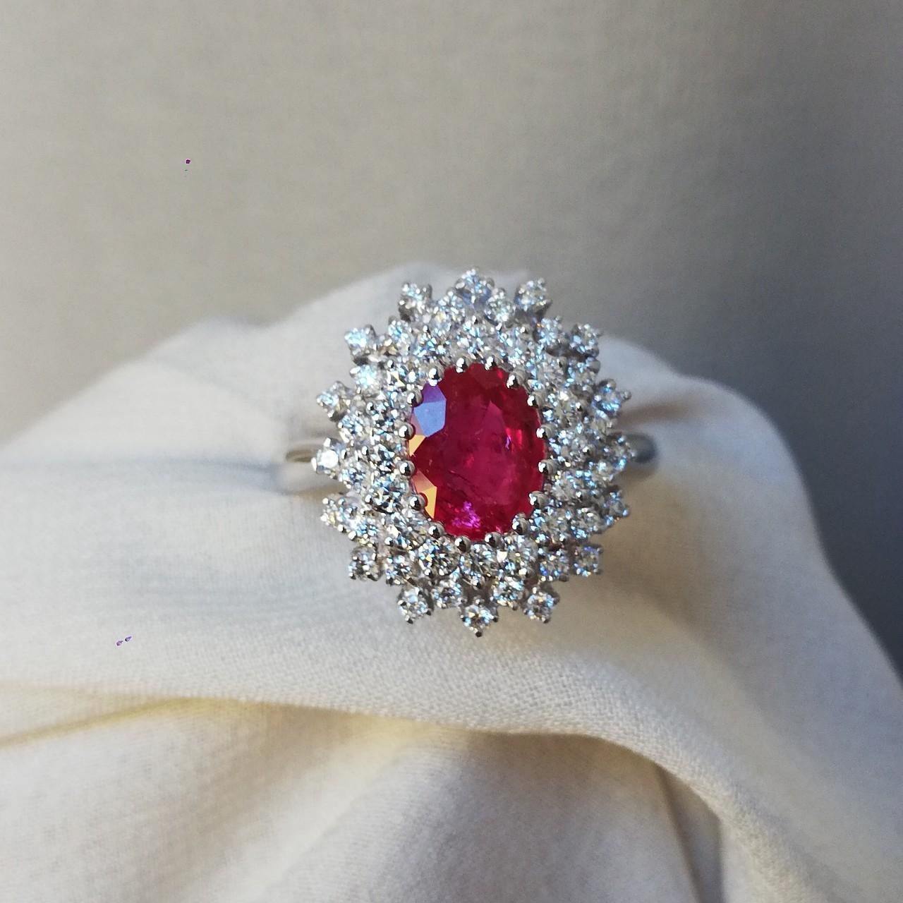 Stunning cocktail ring gold composed by a natural Burmese ruby, origin and stone certified by the gemologist Prof. Orsini of Valenza Po  is the worldwide capital of jewellery; its  history linked to this peculiar production  started in 1817 when