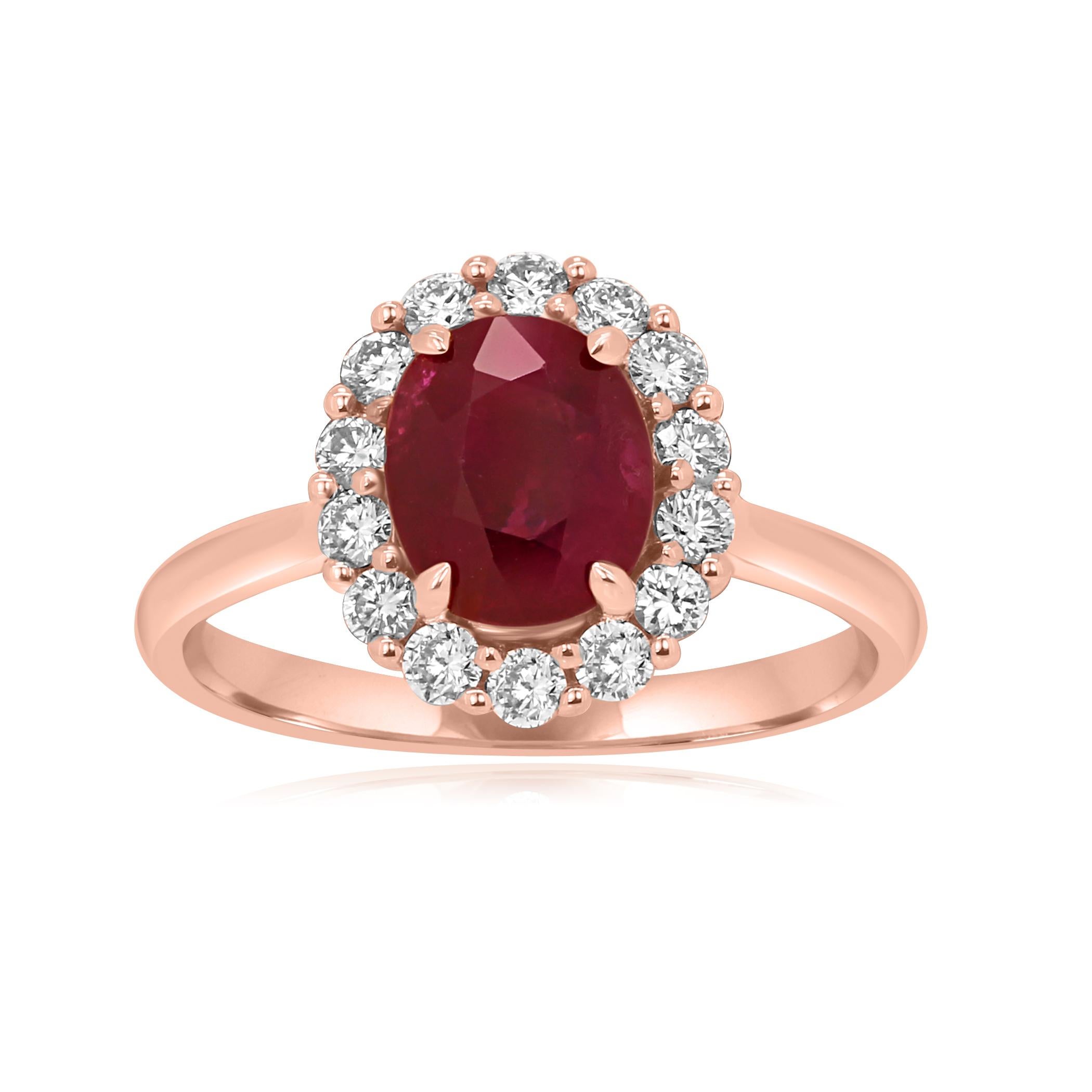 Ruby Oval approximately 2.00 Carat encircled in a Single Halo of White Round Diamond approximately 0.40 Carat in 14K Rose Gold Gorgeous classic Bridal fashion Jewelry.

Total Stone Weight approximately 2.40 Carat 

This is a made to to order ring.