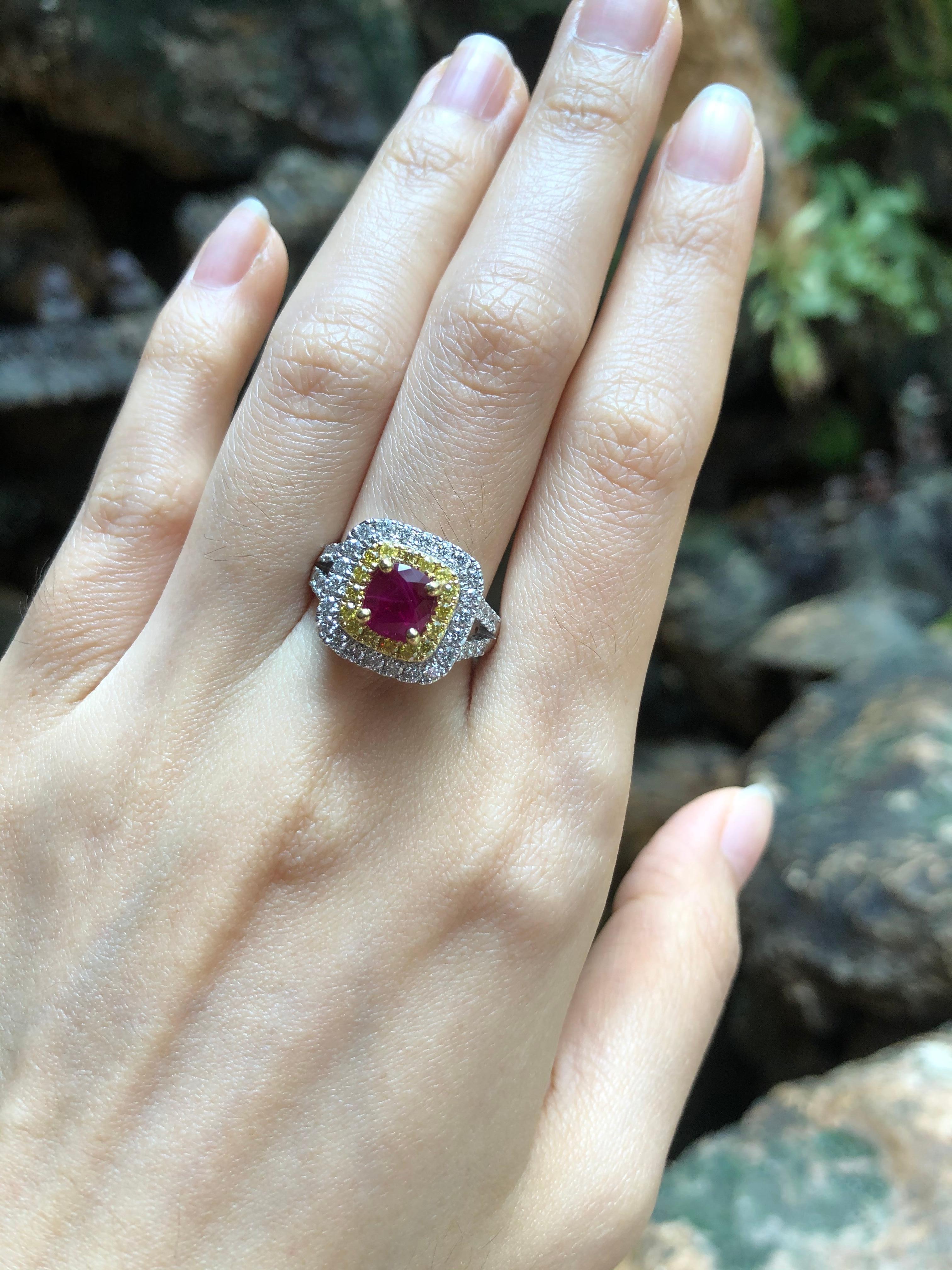 Ruby 1.72 carats with Diamond 0.56 carats and Yellow Diamond 0.27 carat Ring set in 18 Karat White Gold Settings
(GIT Certified, The Gem and Jewelry Institute of Thailand)

Width:  2.0 cm 
Length: 2.0 cm
Ring Size: 53
Total Weight: 9.6 grams

