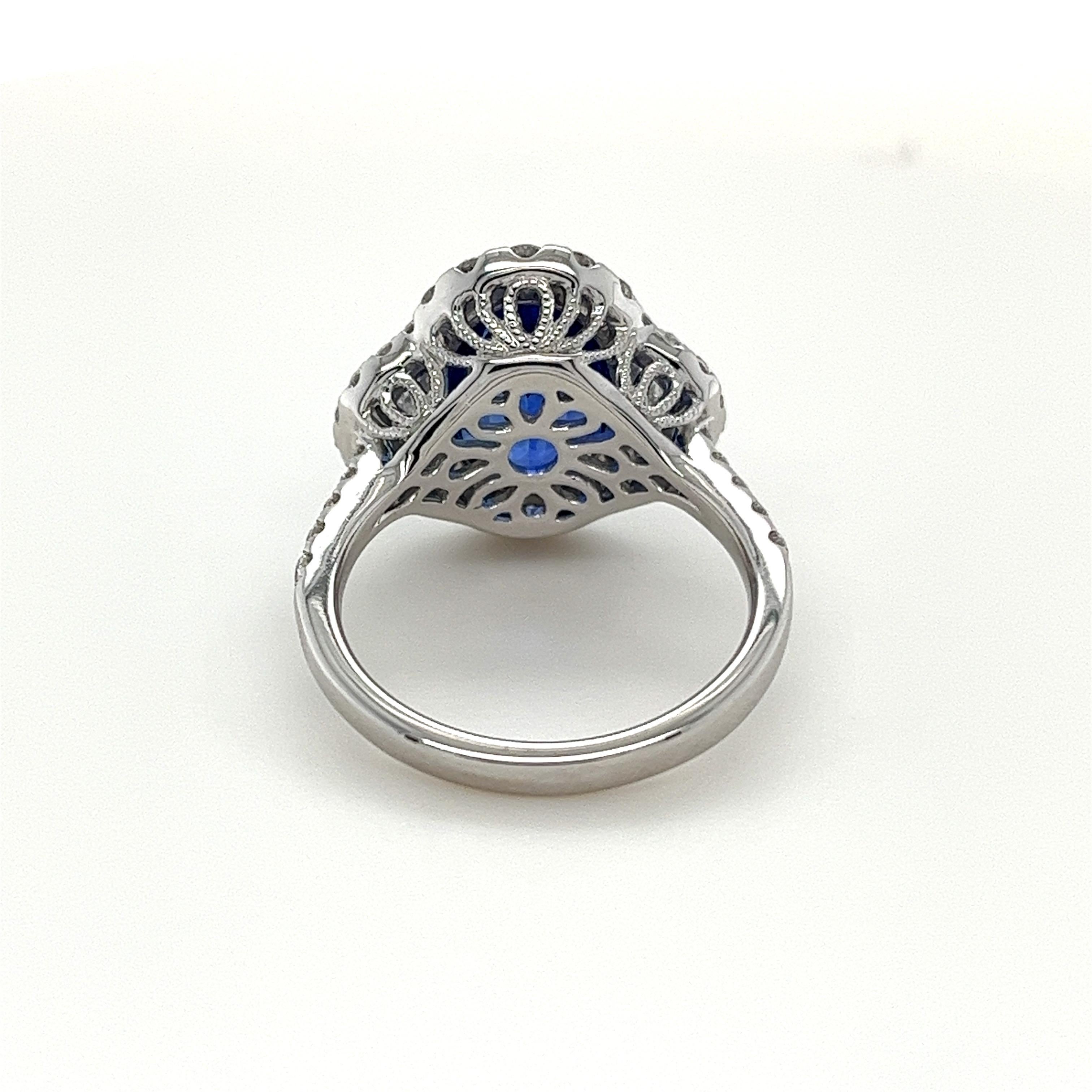 Modern Certified Ceylon Sapphire and Diamond Ring in 18 Karat White Gold For Sale