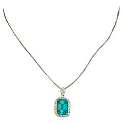 Certified Colombian 6.07 Carat Emerald and Diamond Pendant in Platinum