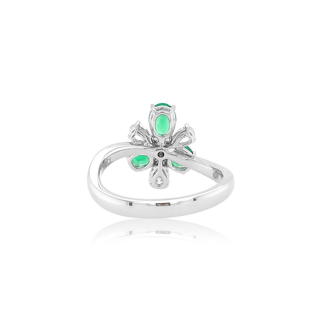 This contemporary ring features three vibrant Oval Shape Colombian Emeralds, setting an elegant arrangement of diamonds. Modern and stylish, this ring will make a statement whenever and however it is styled. It utilises a mesmerising combination. A