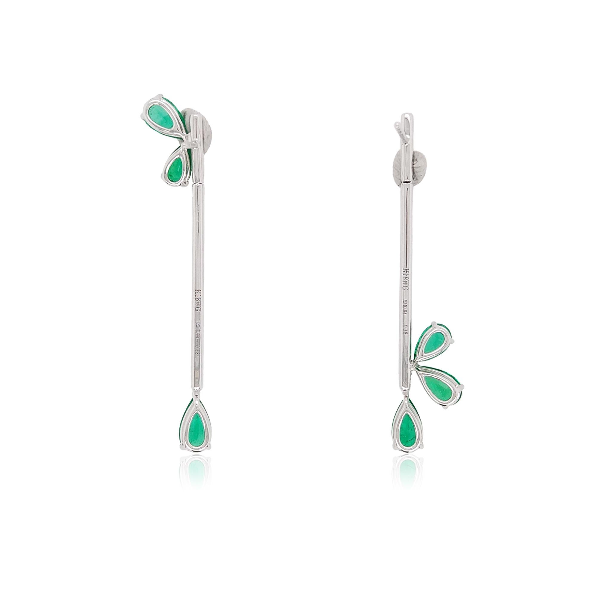 These elegant earrings feature superior rich color Colombian Emerald with a dazzling arrangement of White Diamonds. Striking and sophisticated, these earrings will add a touch of glamour to any outfit.
-	Pear Shape Colombian Emeralds total 1.88
