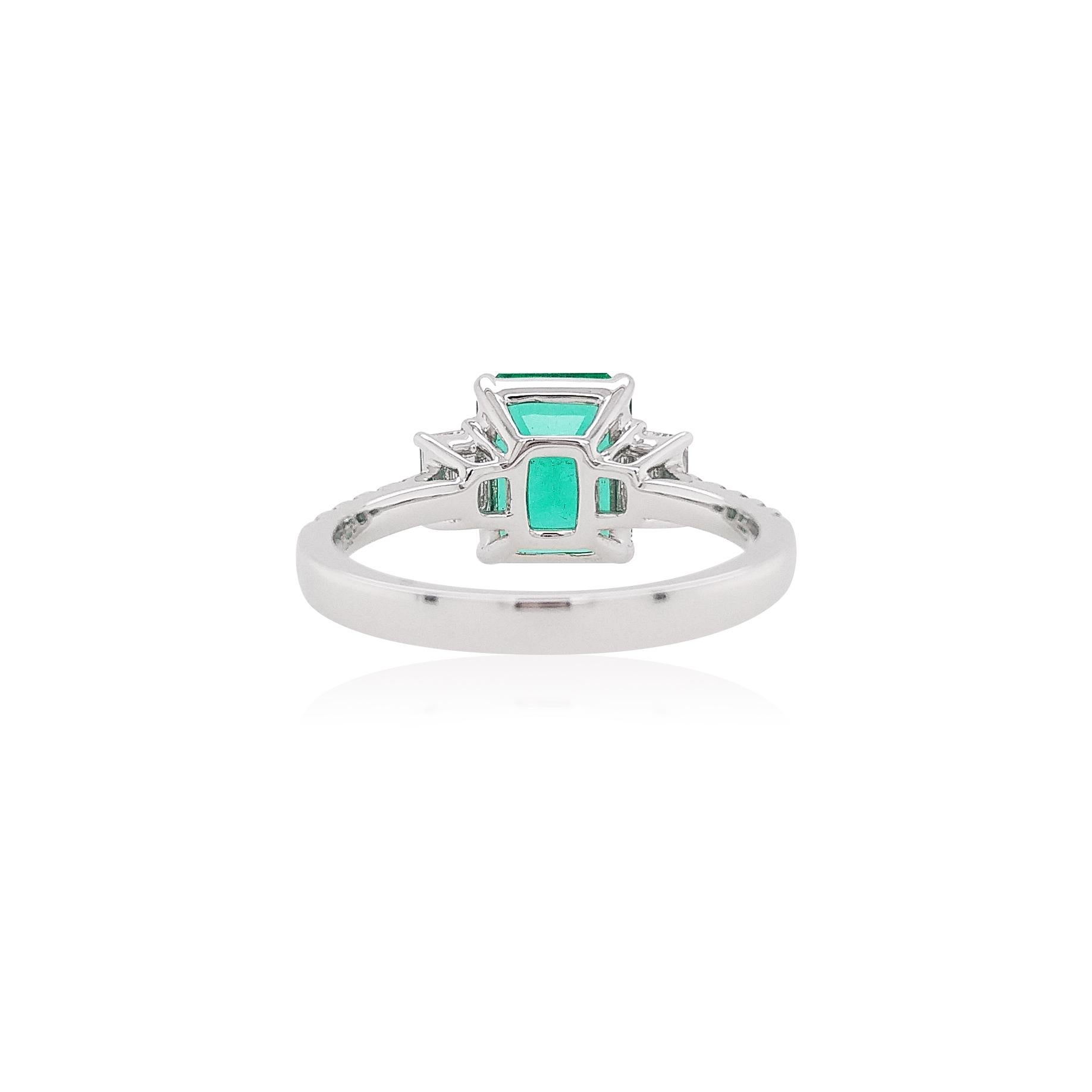 This delicate Platinum ring features a lustrous Colombian Emerald at the forefront of its design. The spectacular hues of the Emerald are perfectly accentuated by the Platinum setting and elegant Emerald-Cut Diamonds shoulders. A versatile piece,