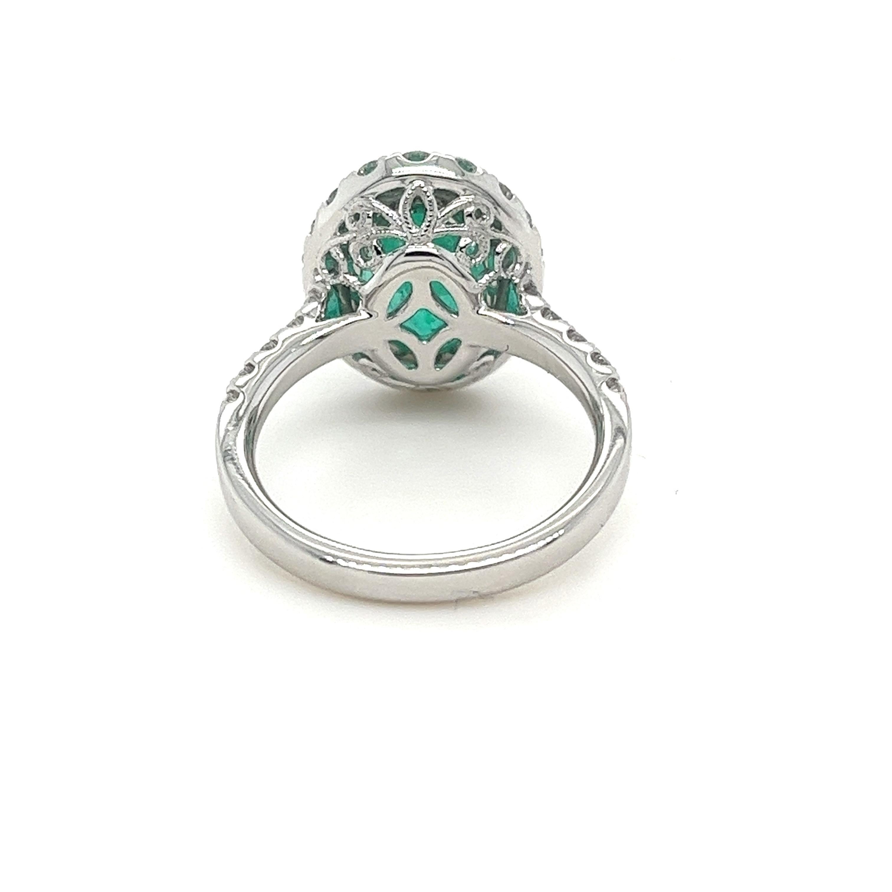Oval Cut Certified Colombian Emerald & Diamond Halo Ring in 18 Karat White Gold For Sale