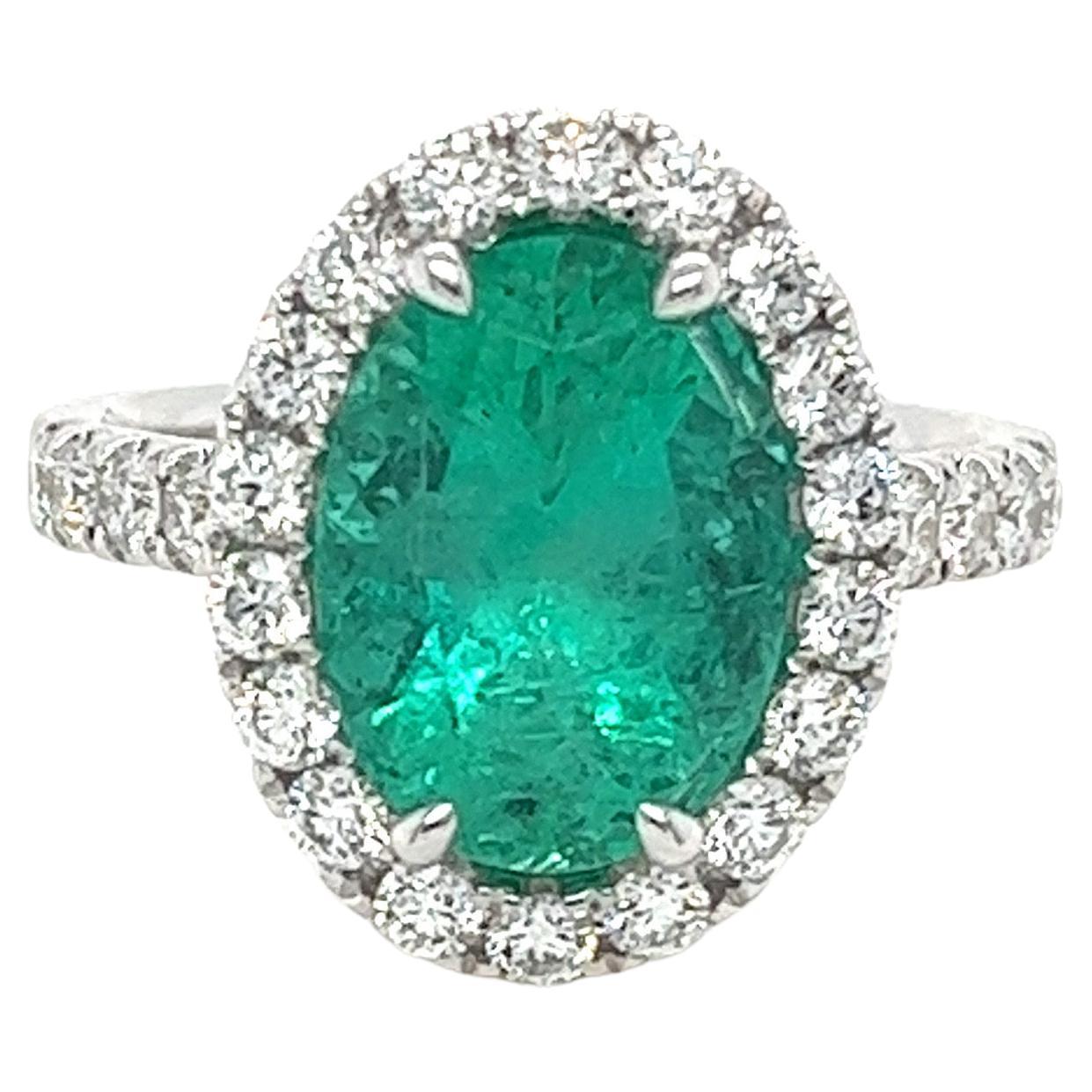 Certified Colombian Emerald & Diamond Halo Ring in 18 Karat White Gold