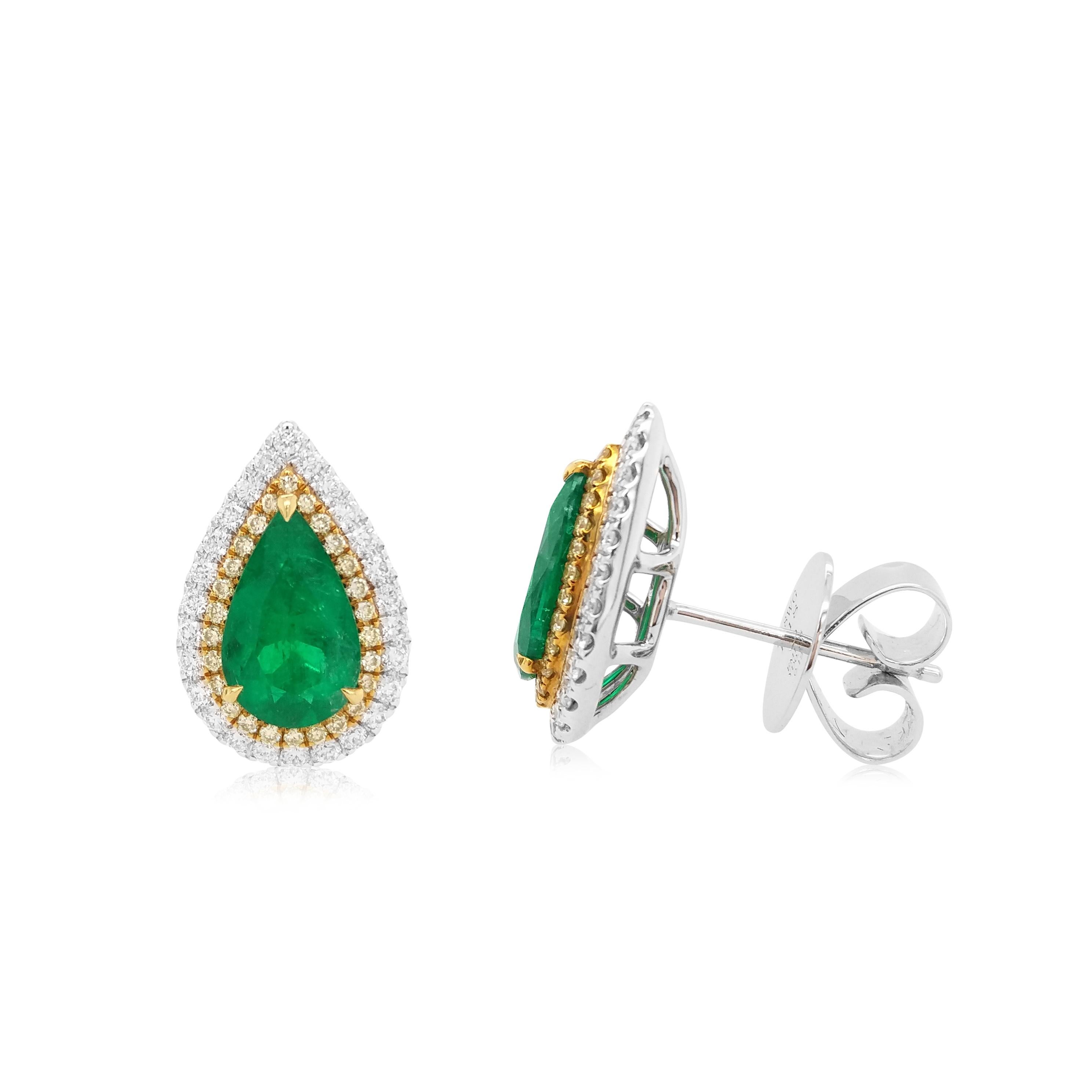 These important earrings feature rich hue Colombian Emeralds set among clusters of Yellow and White diamonds. An iconic design re-imagined, these earrings are sure to bestow the wearer with a glamorous look, each time they are worn.
-	Pear Shape
