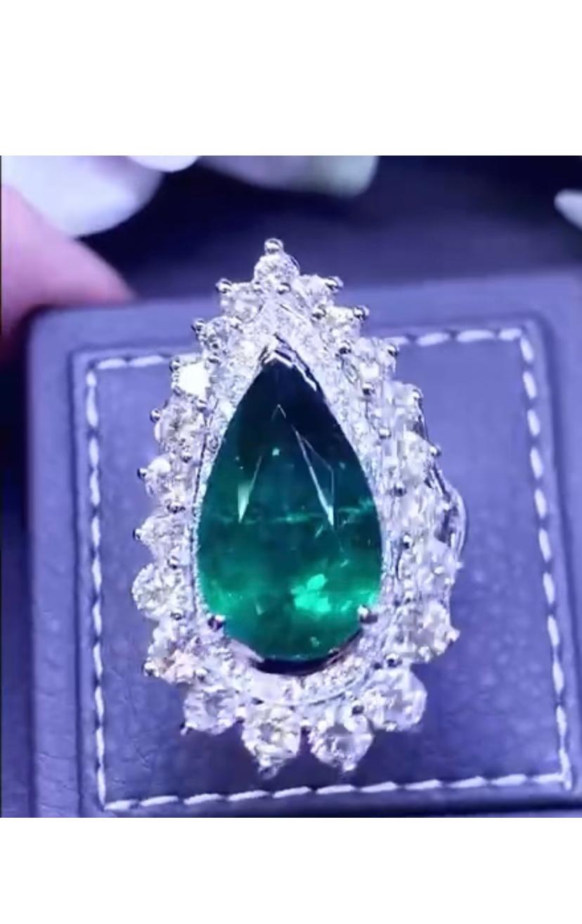 So stunning design made entirely by hand by artisan goldsmith, in 18k gold with natural Zambia emerald pear cut 14,22 ct , and natural diamonds 💎 round brilliant cut 5,97 ct F/VS. 
From high jewels collection.
Exceptional manufacturer and