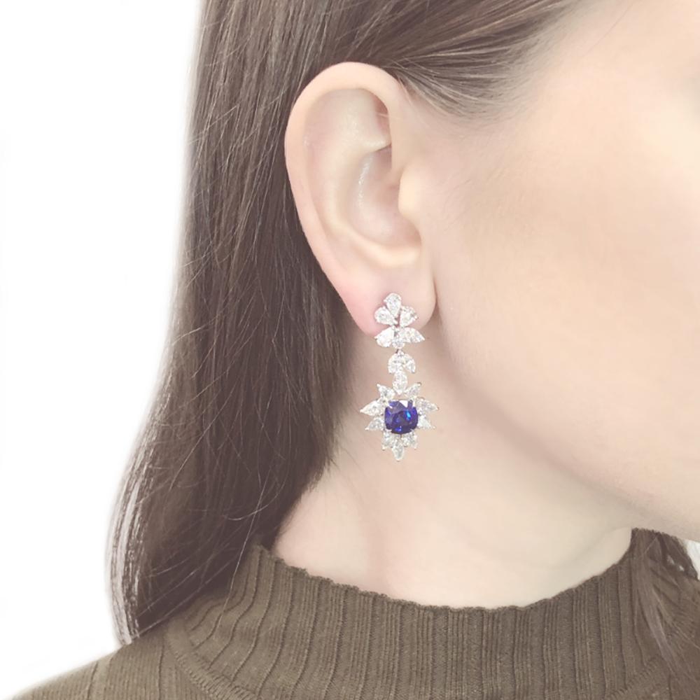 Handcrafted platinum chandelier earrings.
Certified cushion cut Ceylon blue sapphires 8.38 ct in total.
Accented with pear and marquise cut white diamonds 8.79 ct in total.
Diamonds are all natural in G-H Color Clarity VS. 
Platinum 950. 
French /