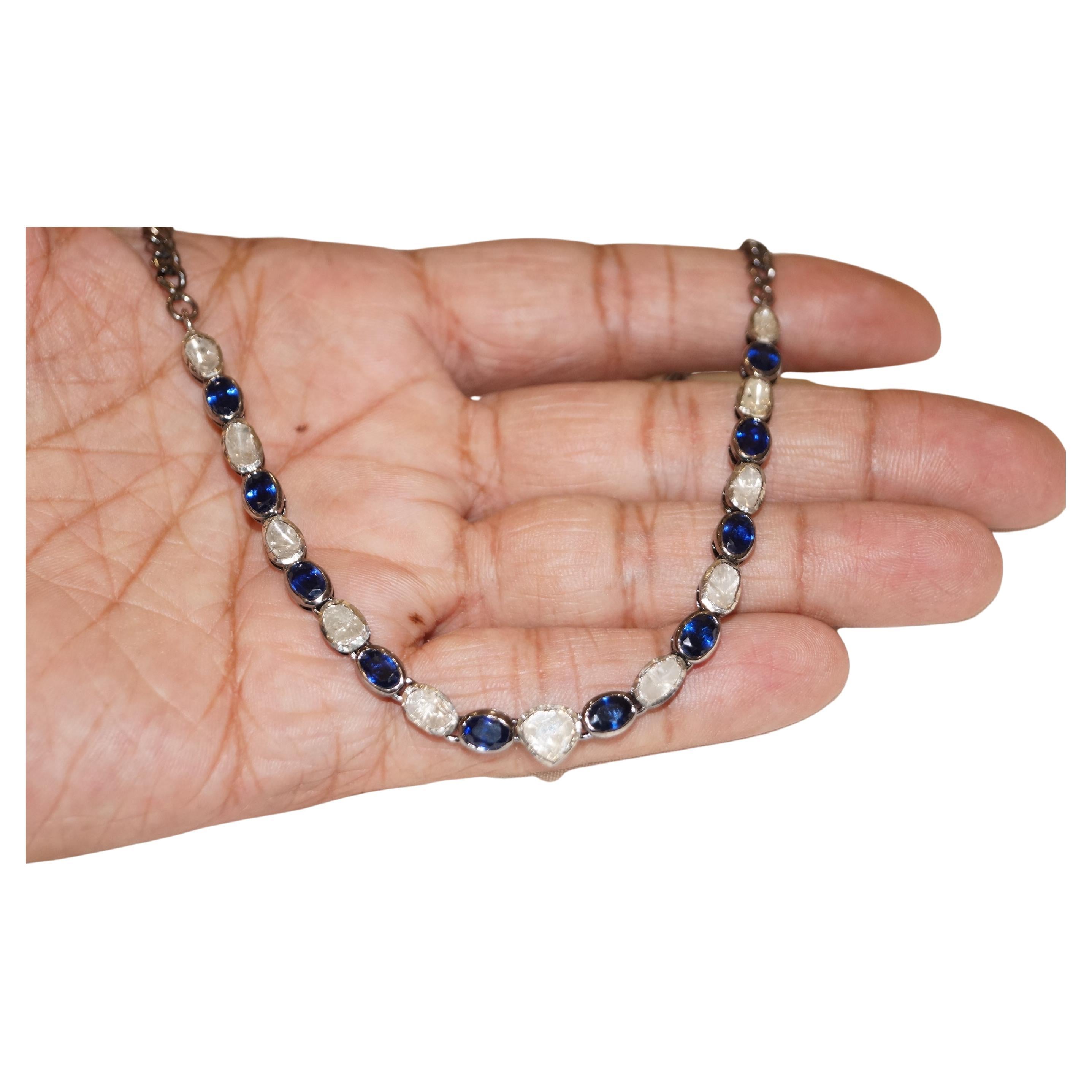 This beautiful diamond choker is handcrafted with sparling diamonds and blue sapphires. Its elegant style and charm enhances the aura and beauty of the bride.
This necklace has finely chosen natural uncut diamonds. Natural Blue sapphire that are set