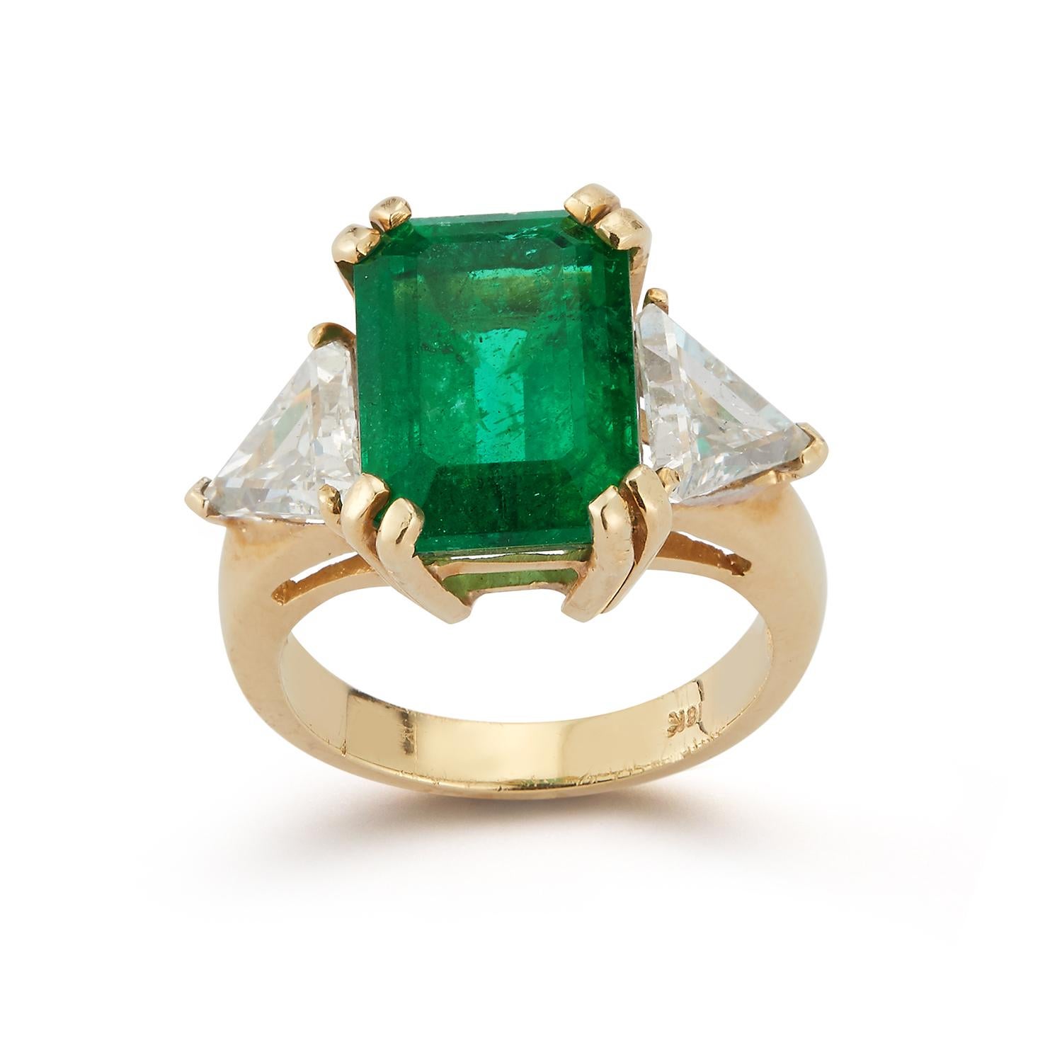 Certified Emerald & Diamond Gold Three Stone Ring set in 18k Yellow Gold
Emerald Weight: 7.48 Cts
Diamond Weight: 1.93 Cts
Ring Size: 6.25
Re-sizable free of charge 