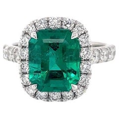 Certified Emerald & Diamond Halo Ring in Platinum