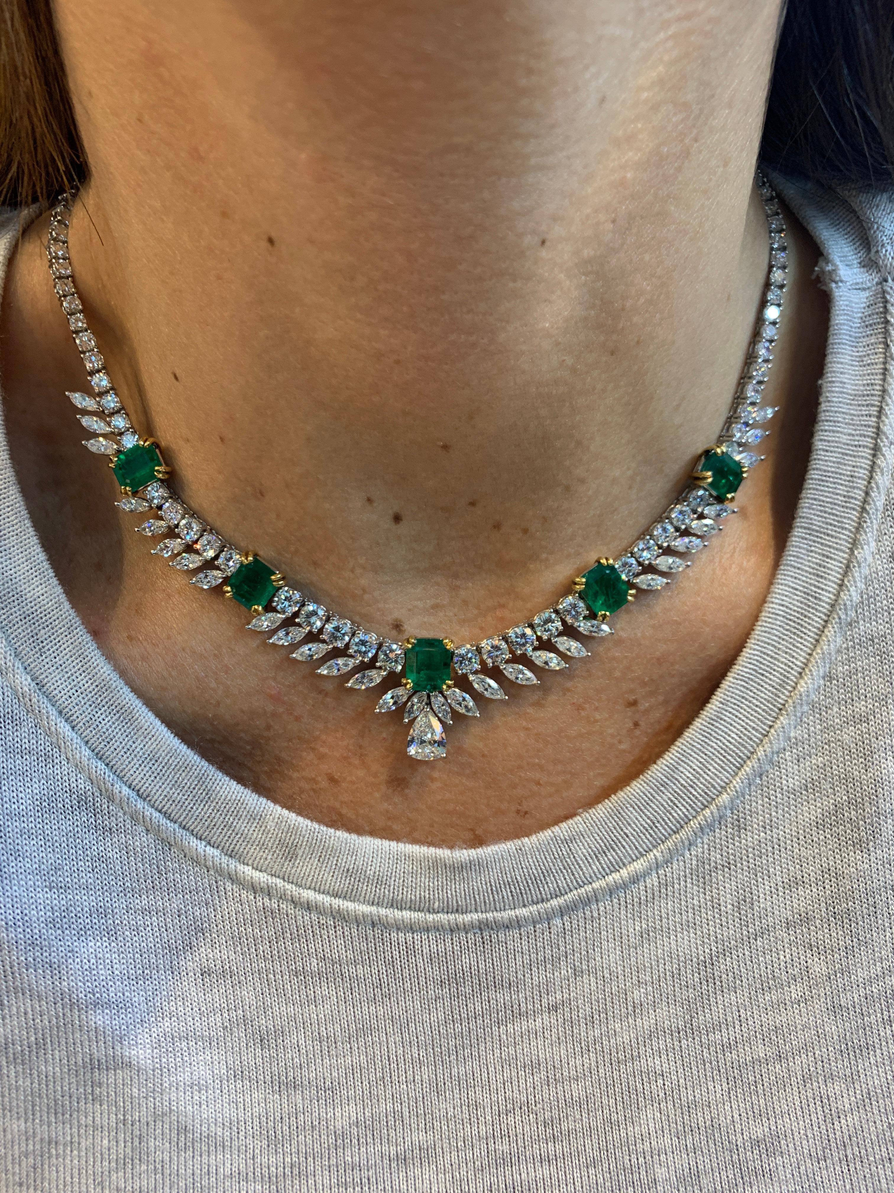 Emerald & Diamond Necklace, marquise round & pear cut diamonds all set in 18K white gold along with 5 emerald cut emeralds
Diamond Weight: approx 18.05 Cts
Emerald Weight: approx 7.50 Cts
Measurements: 15