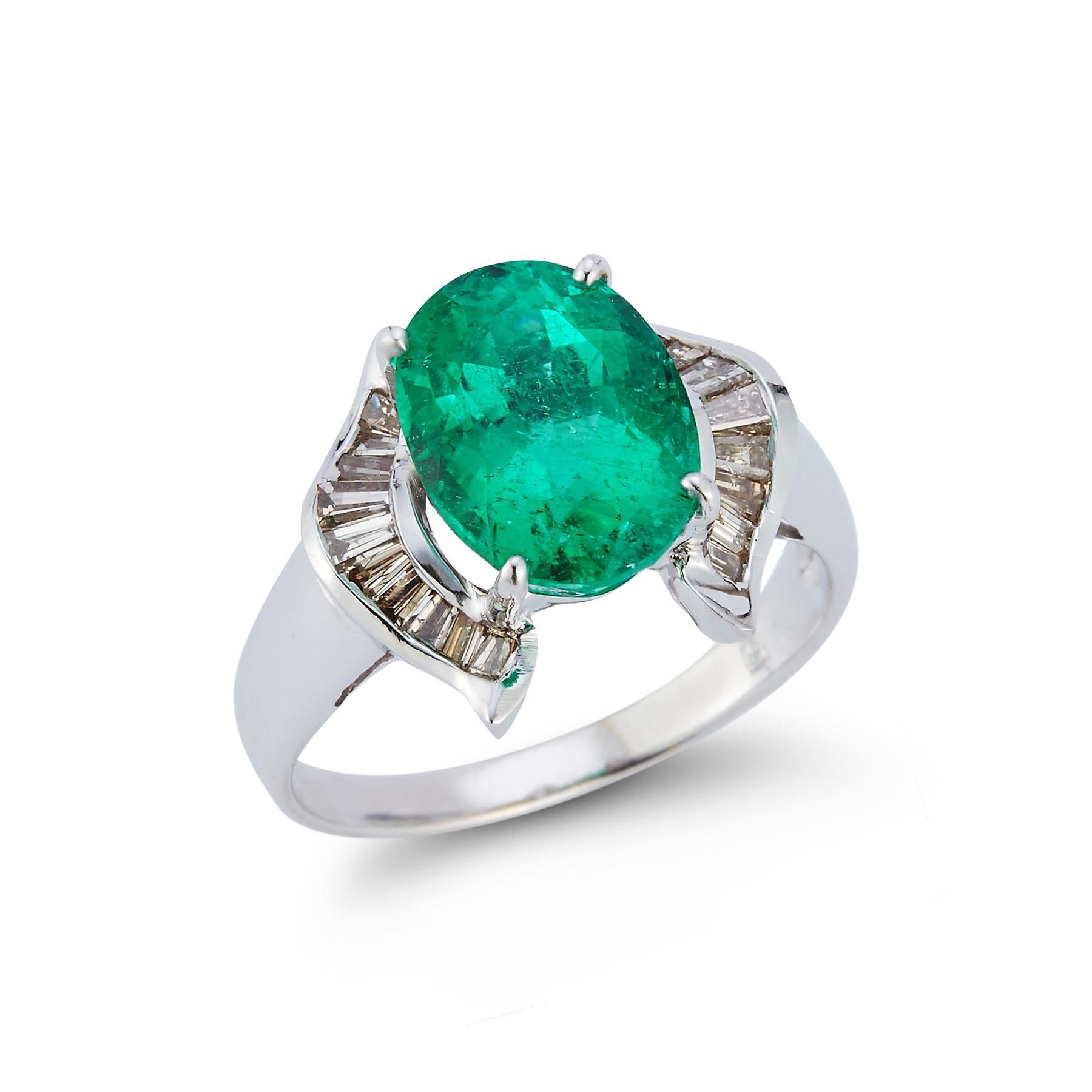 Certified Emerald & Diamond Ring, one oval cut emerald set in 4 prongs surrounded by baguette diamonds all set in 18k white gold.

Emerald Weight: 4.17 Cts

Ring Size: 7.5

Re sizable to any size free of charge




