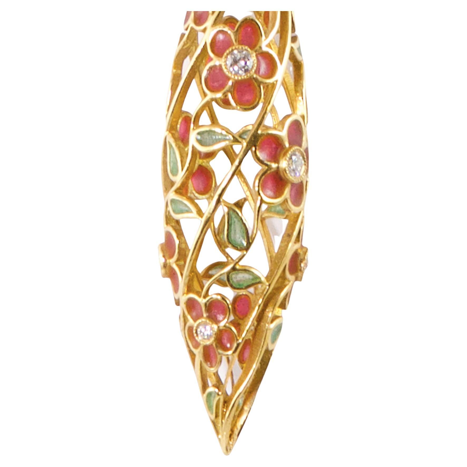 Or jaune 18K 750
Chaud émaillé
0,74 ct. Diamant rond