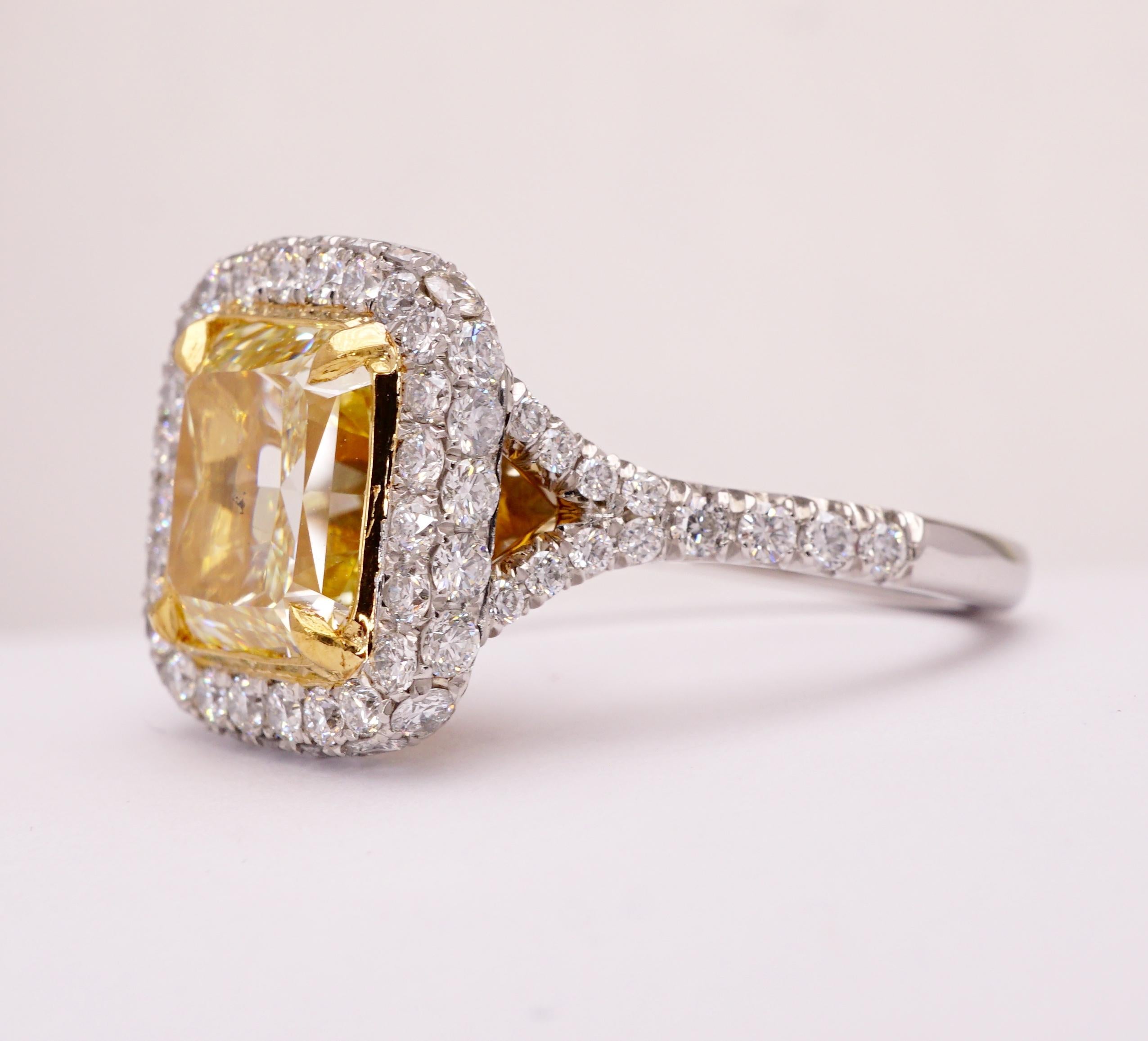 Contemporary Certified Fancy Yellow Radiant 2.84 Carat Diamond Cocktail Ring Set in Platinum For Sale