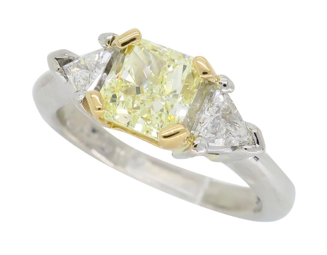Certified Fancy Yellow Three-Stone Diamond Ring in Platinum and 18 Karat Gold In Excellent Condition In Webster, NY