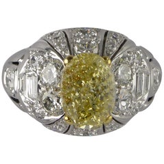 Certified Fancy Yellow Untreated Diamond 2.11 Carat Gold Bombe Ring, circa 1960