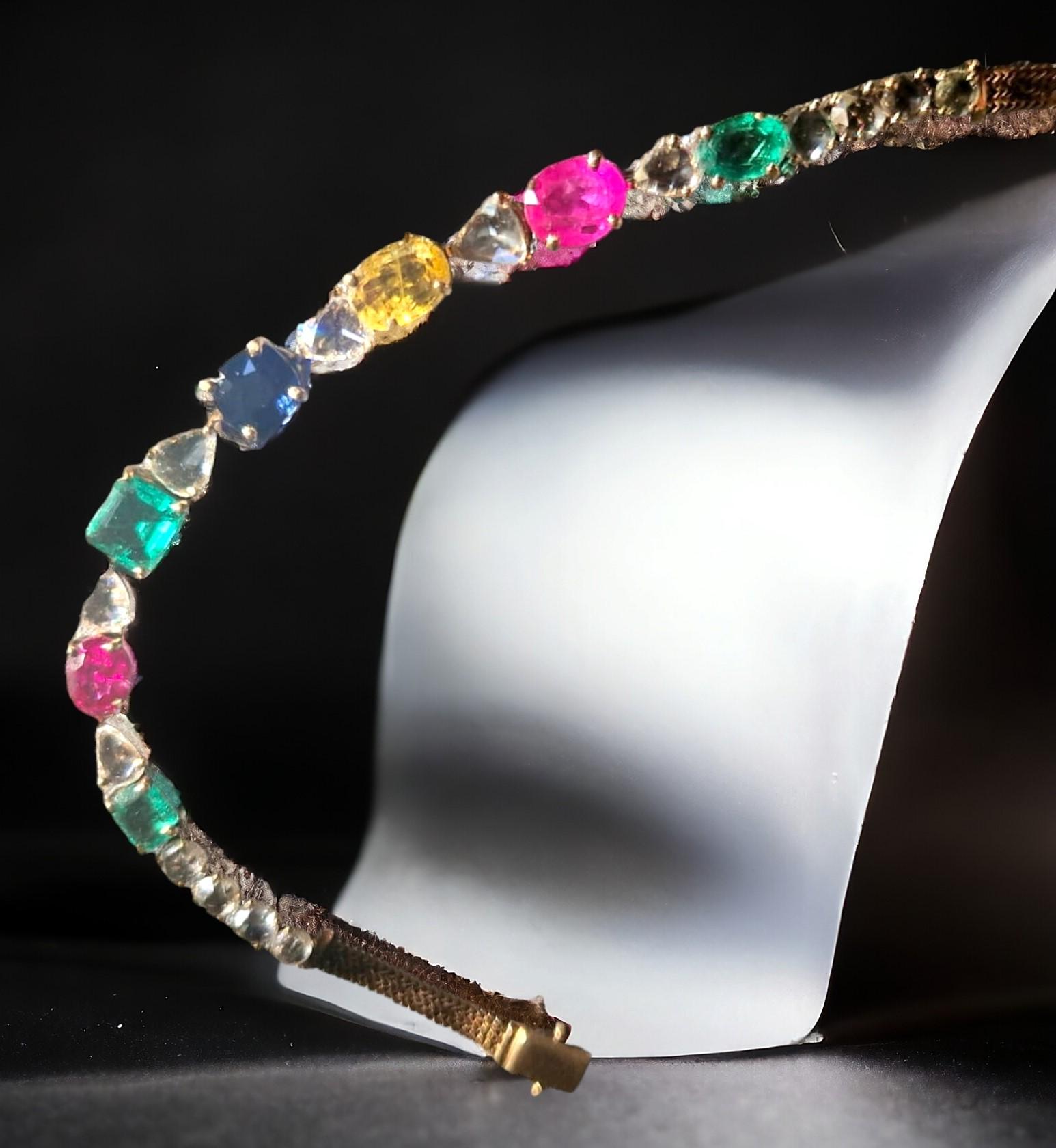 Taille ovale Bracelet 'Tutti Frutti' certifié serti d'émeraudes, de rubis, de saphirs et de diamants. en vente