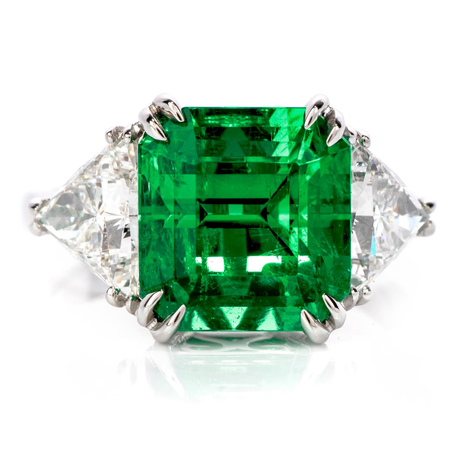 Dover Jewelry Present this Stunning Square Colombian Emerald Diamonds handcrafted is solid platinum. Displaying vibrancy and elegance, it is centered with 1 genuine square cut Emerald extremely fine in color and clarity, weighing approx. 5.81carats,