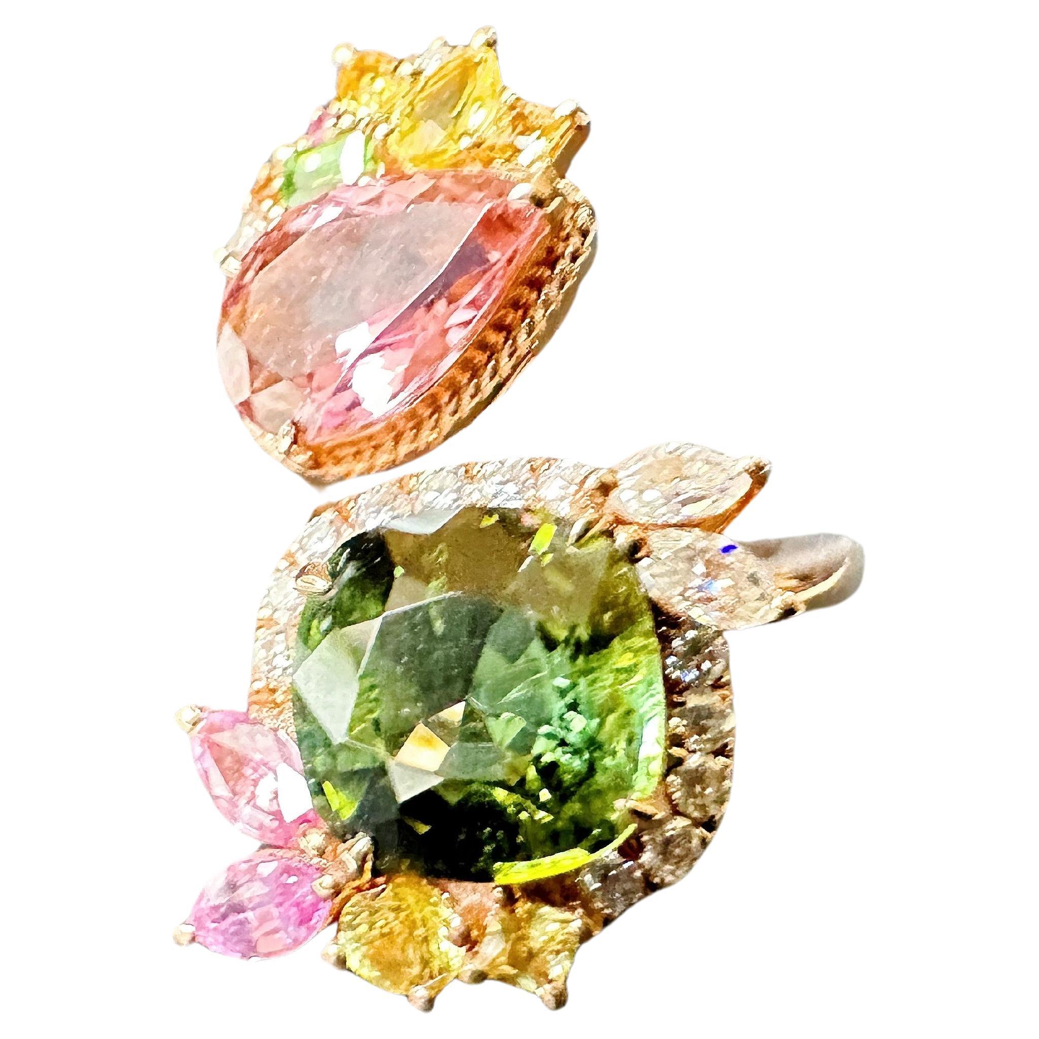 We handpick these stunning, beautiful green and pink tourmalines. Accompanied by brilliant yellow, green, and pink colored moissanite, this custom-designed twin gemstones statement ring is simply unique and one-of-a-kind. The fancy color burst of