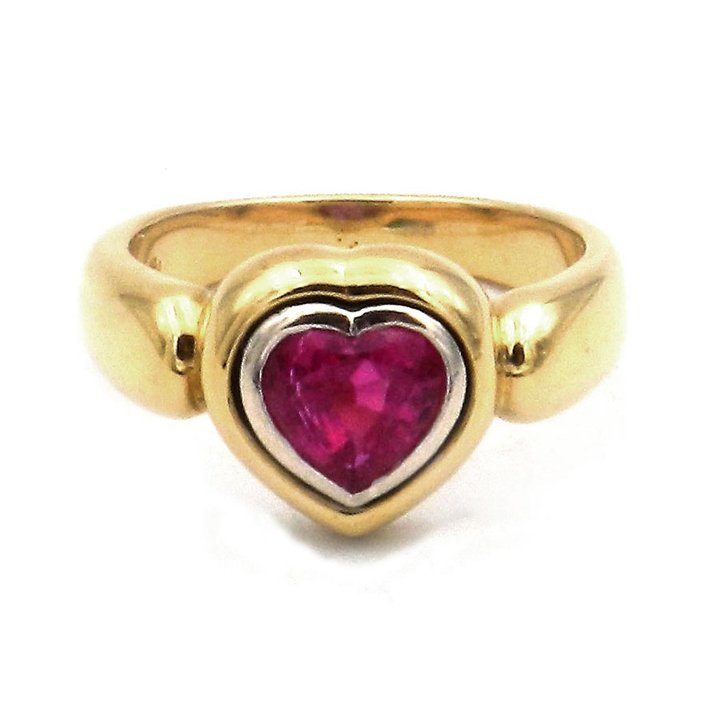 Certified Heart Shaped 1.3 ct No Heat Ruby 18 K Yellow Gold Ring

Attractive gold ring with a heart-shaped natural ruby, edged in platinum, the solid ring band made of 18 K yellow gold. Meticulously handcrafted and signed with maker's mark.

