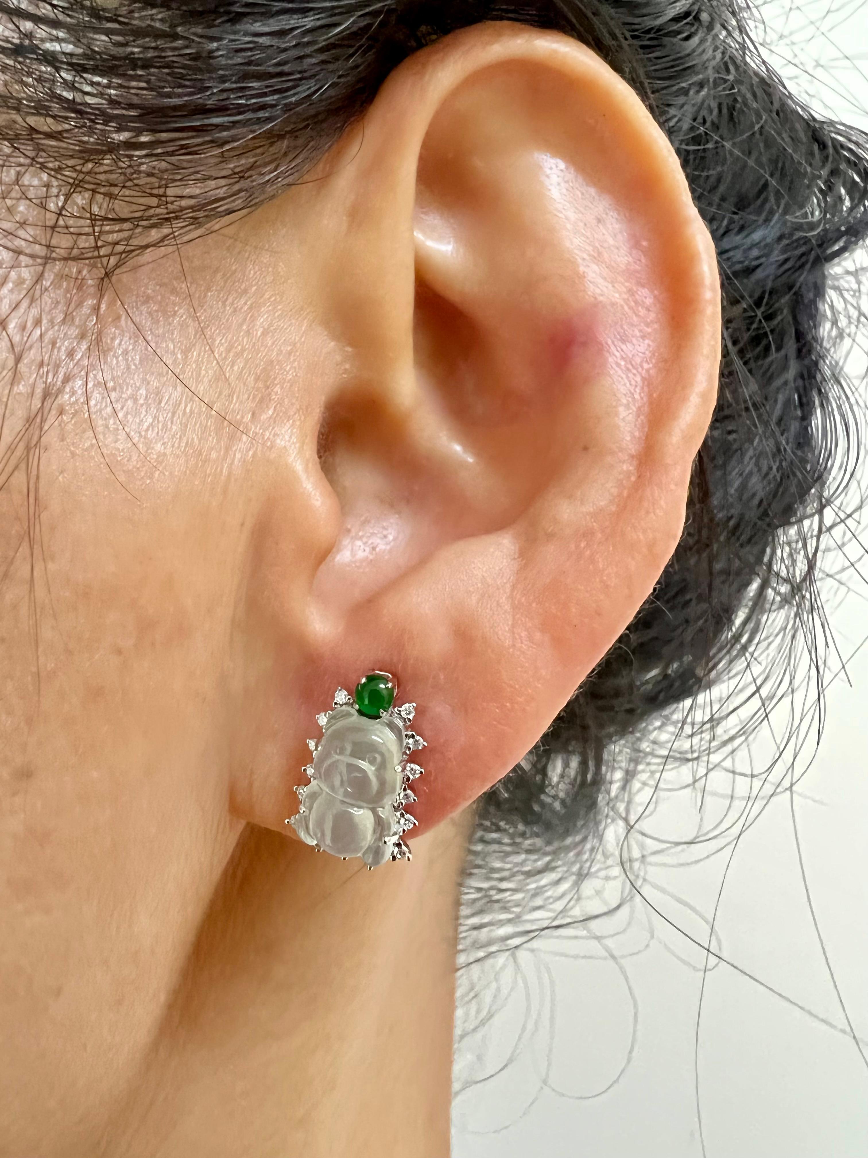 Please check out the HD video! The perfect icy jade earrings! Here is a pair of natural Icy Jadeite Jade and diamond earrings. This is a specialty gummy bear cut. Icy jade of this quality is extremely hard to come by and is in high demand. Even in