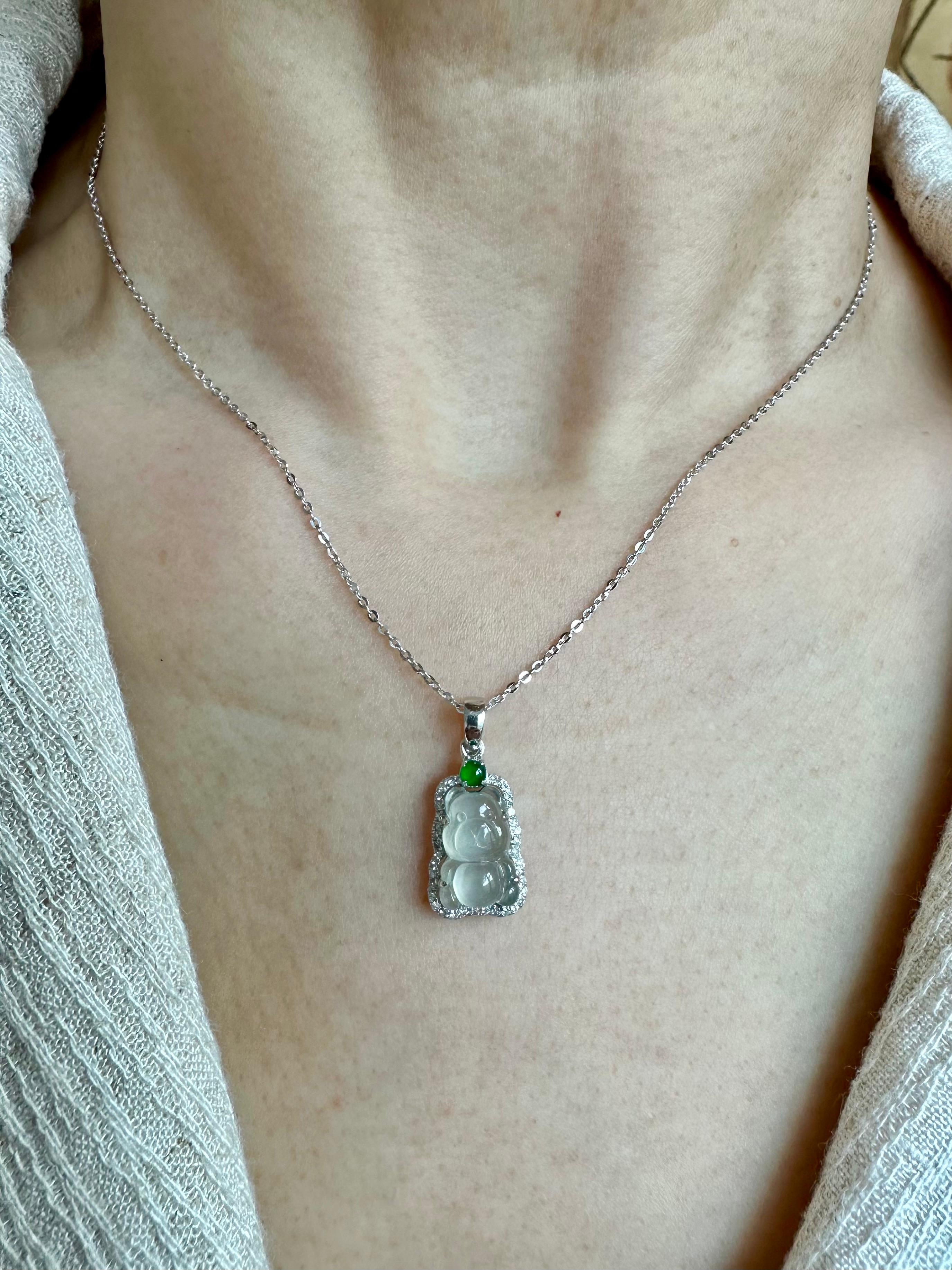 Please check out the HD video! The perfect icy jade pendant! This is a specialty gummy bear cut. Icy jade (certified) of this quality is extremely hard to come by and is in high demand. Even in higher demand is the imperial green jade cabochon. The
