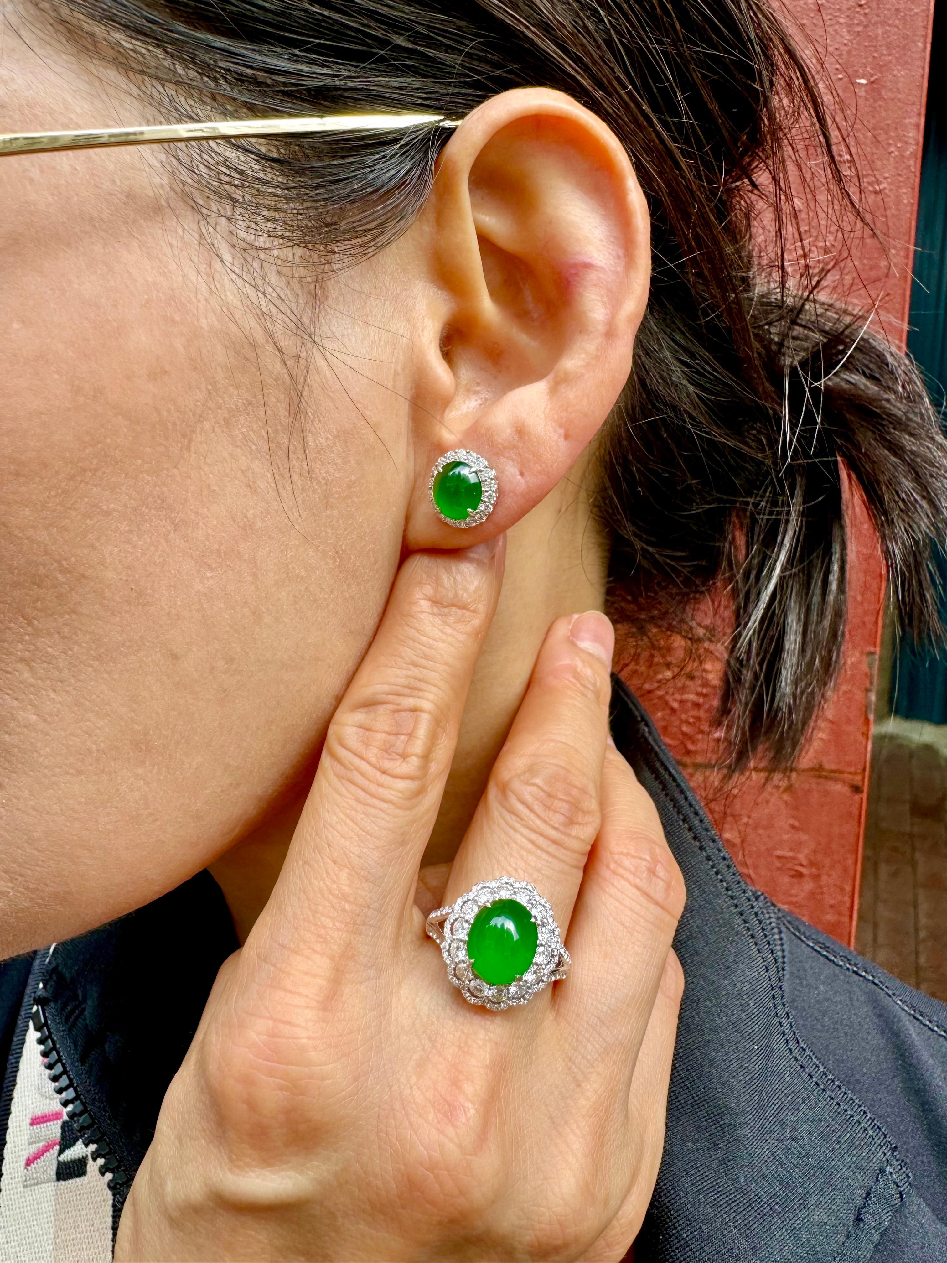 Please check out the HD video! It doesn't get much better than this! This is sold as a SET. In the set is a pair of stud earrings and a matching cocktail ring. The imperial green Jadeite Jade earrings has the best of the best glowing green color.