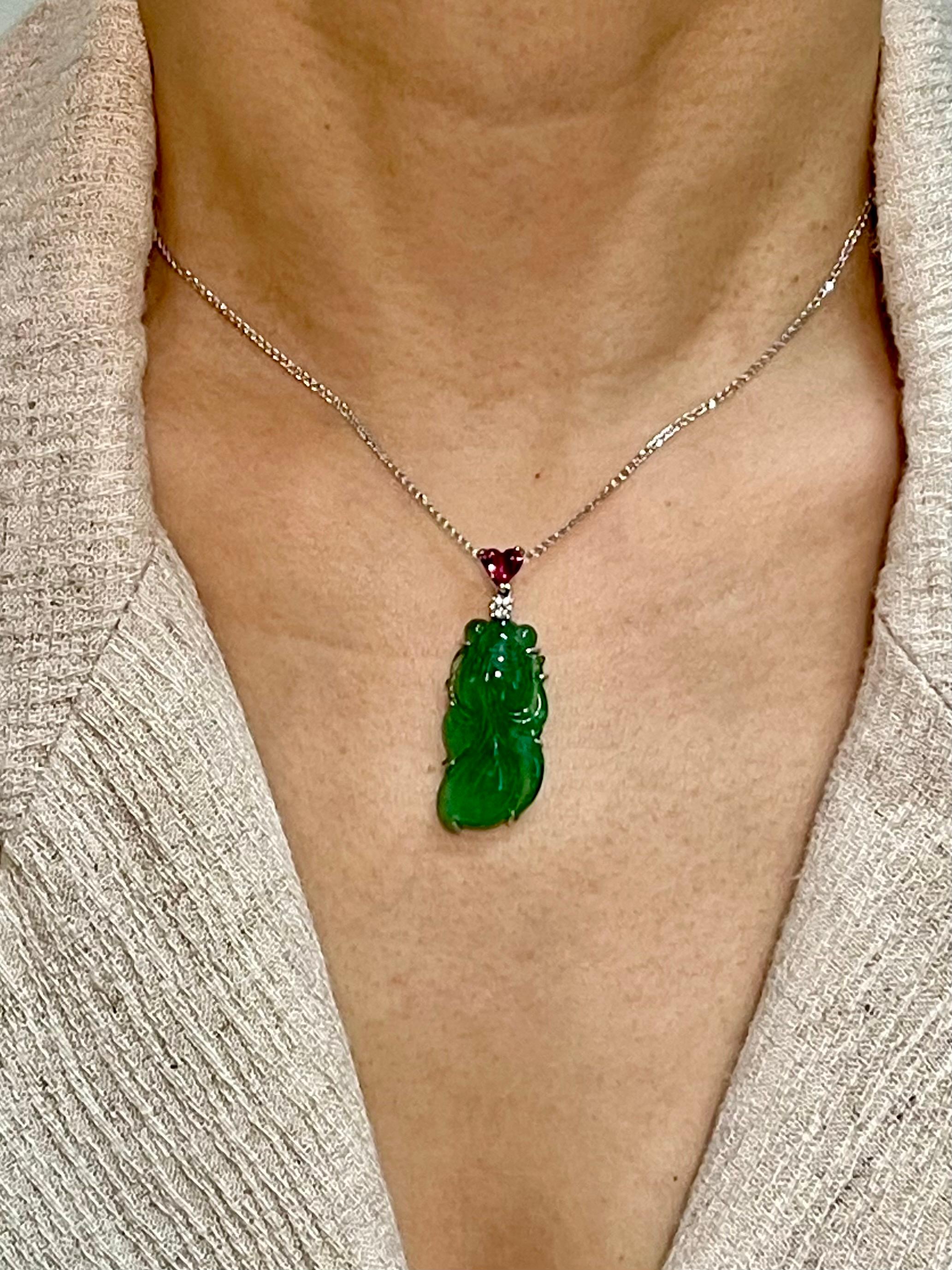 Please check out the HD video! This goldfish pendant is amazing and it GLOWS. It is equally good looking from the front as it is from the back. The imperial jade is full of 