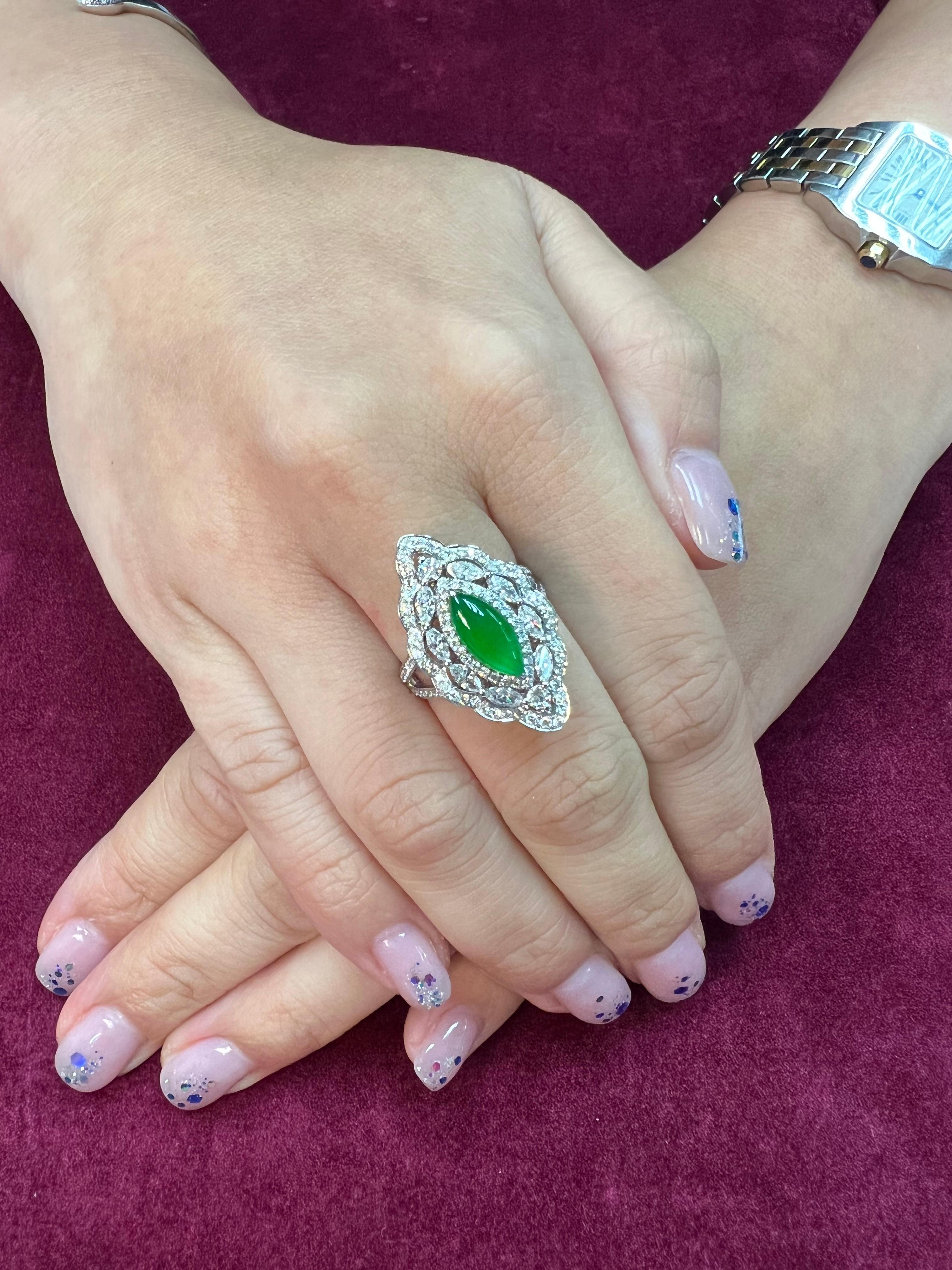 Please check out the HD video. The GLOW (under normal light) on this jade is excellent! It's even nicer in person than any videos or photos. Here is a bright apple green Jade and diamond ring / pendant. This is a versatile piece, you can wear it as