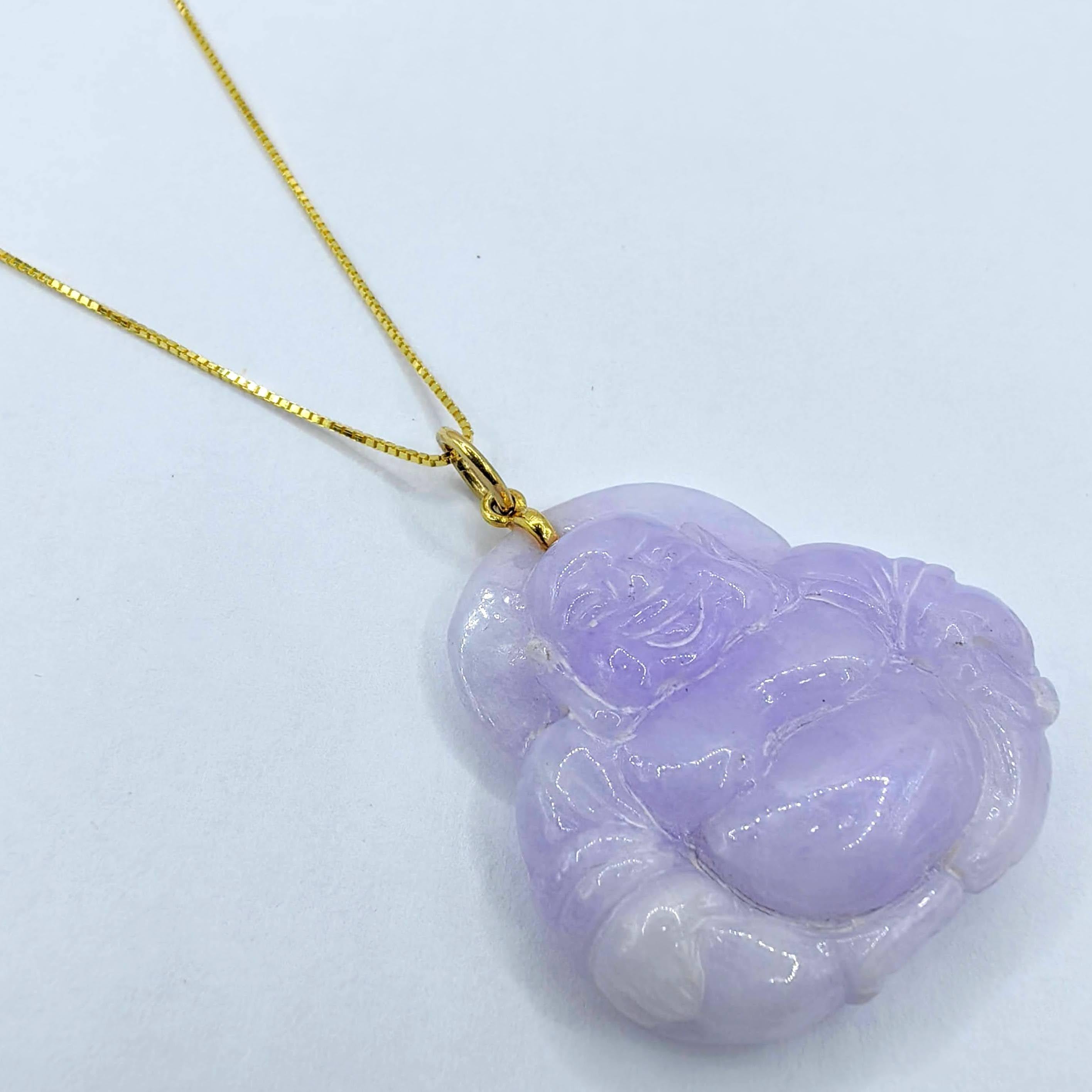 Radiating serenity, joy, and divine protection, this exquisite Laughing Buddha pendant is meticulously hand-carved from certified Natural Type A Fei Cui (Jadeite Jade) in a rare and captivating lavender hue. Known for symbolizing happiness, wealth,