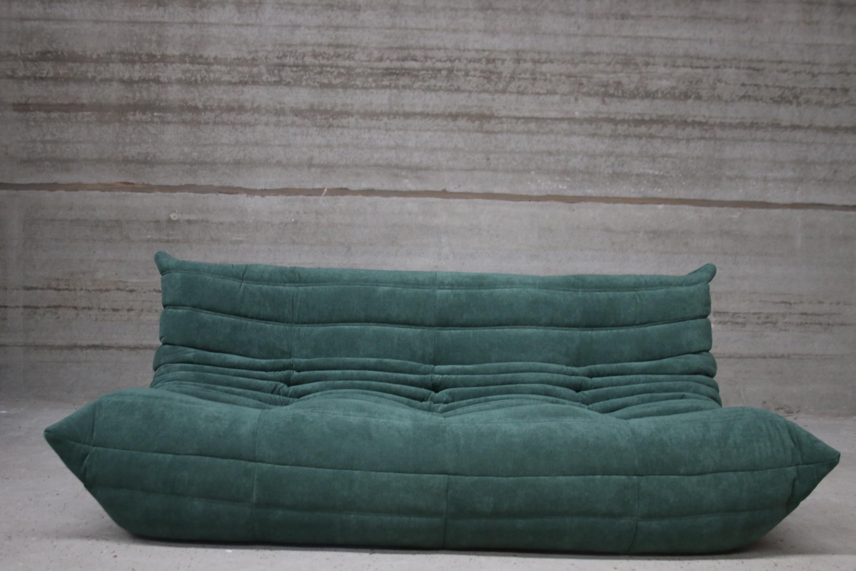 Iconic French vintage lounge chair, beautifully reupholstered in our brand new, stain free, washable and very durable 