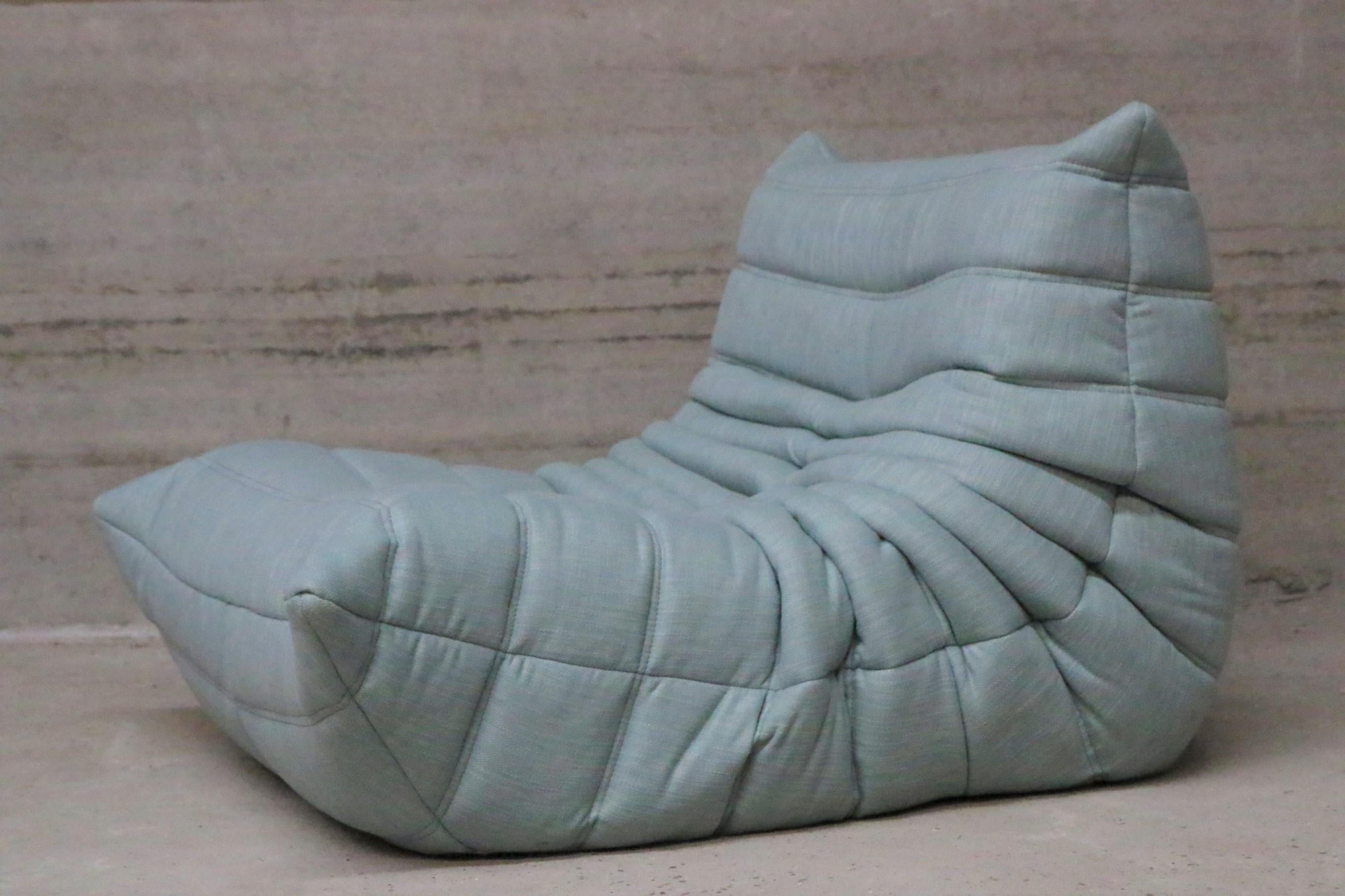 Iconic French vintage lounge chair, beautifully reupholstered in our brand new, stain free, washable and very durable 
