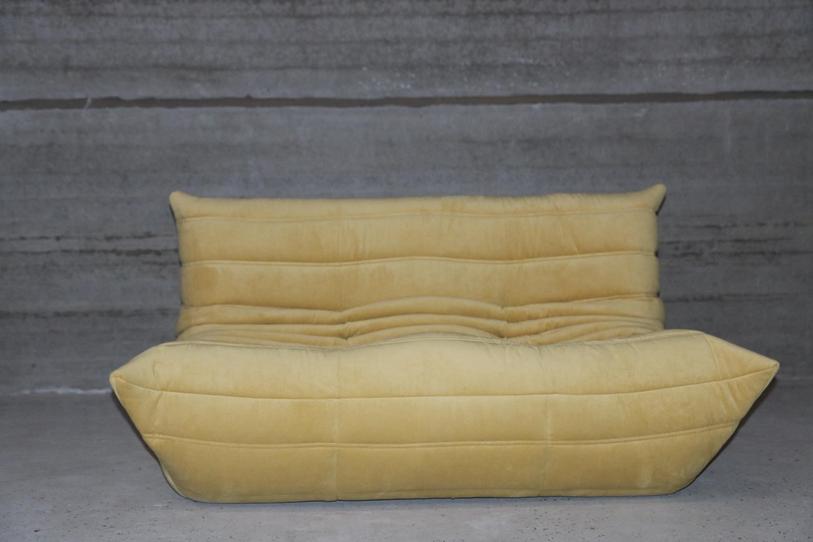 Iconic French vintage small settee, beautifully reupholstered in our brand new, stain free, washable and very durable 