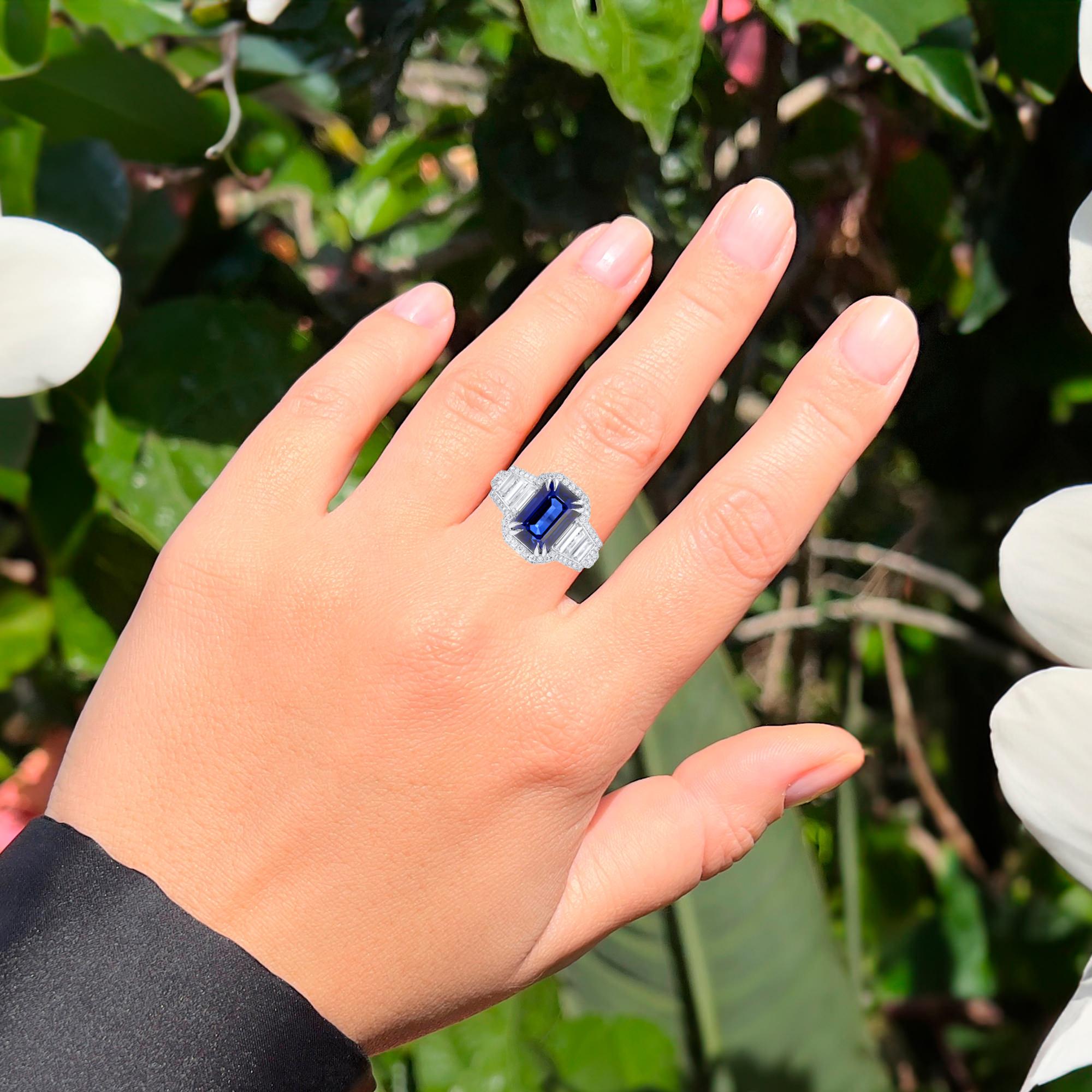 Lotus Gemology Certified 
All Gemstones are Natural
Certified Blue Sapphire = 5.15 Carat
Cut: Emerald
Origin: Madagascar
144 Diamonds = 1.50 Carats
Cut: Trapezoid , Round
Metal: 18K White Gold
Ring Size: 6.5 US
*It can be resized complimentary